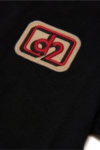 Camiseta de cuello redondo de jersey de algodón con parche