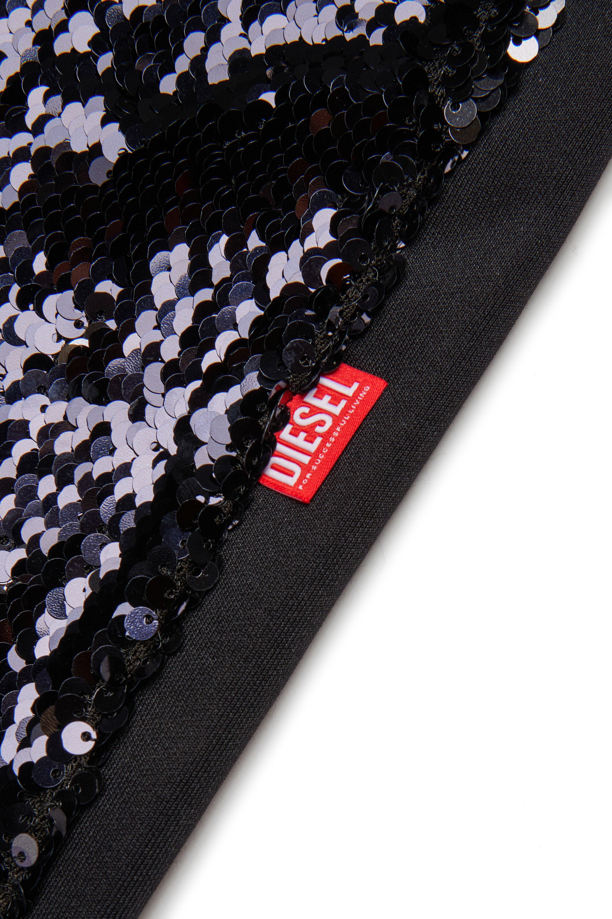 Pantalones flare con lentejuelas