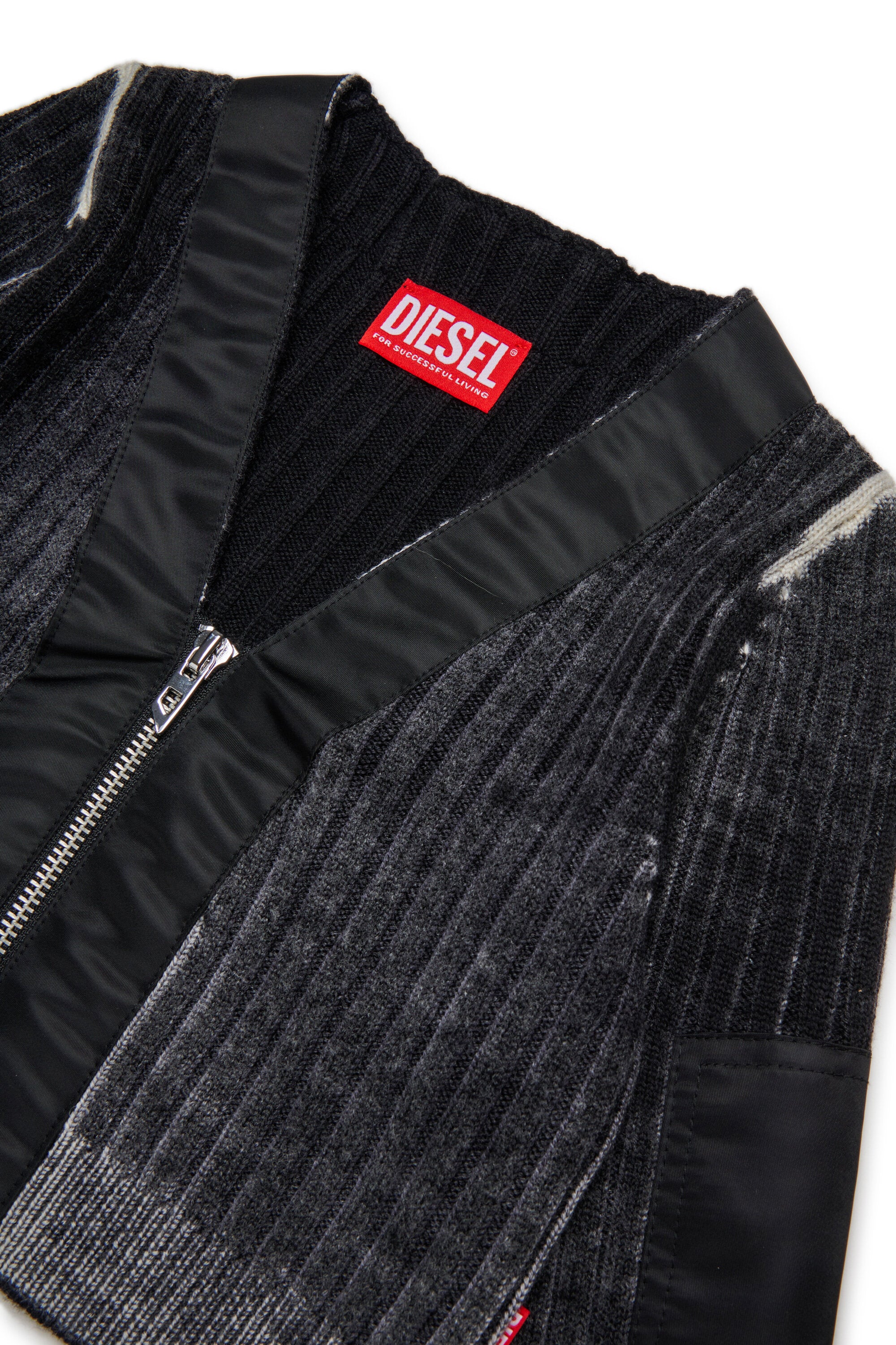 Cárdigan de canalé de lana merina con inserciones