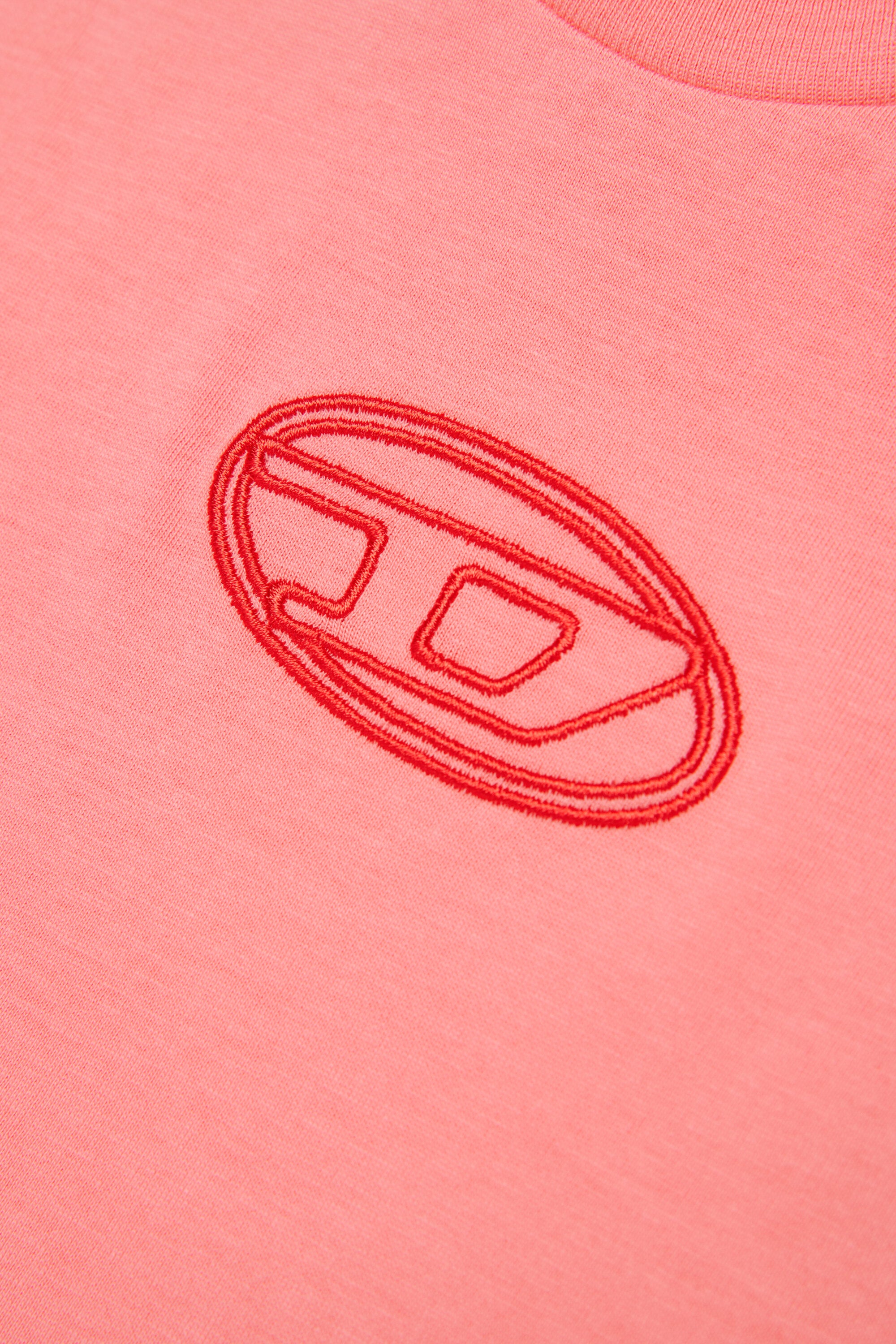 Camiseta boxy de punto con el logotipo de la Oval D