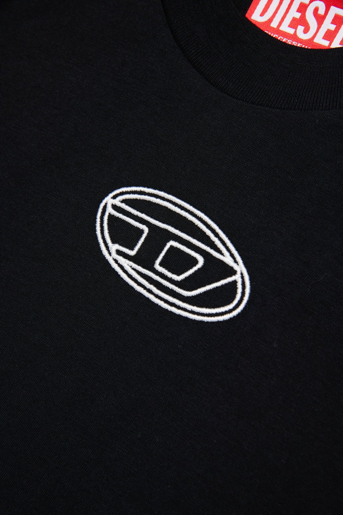 Camiseta boxy de punto con el logotipo de la Oval D