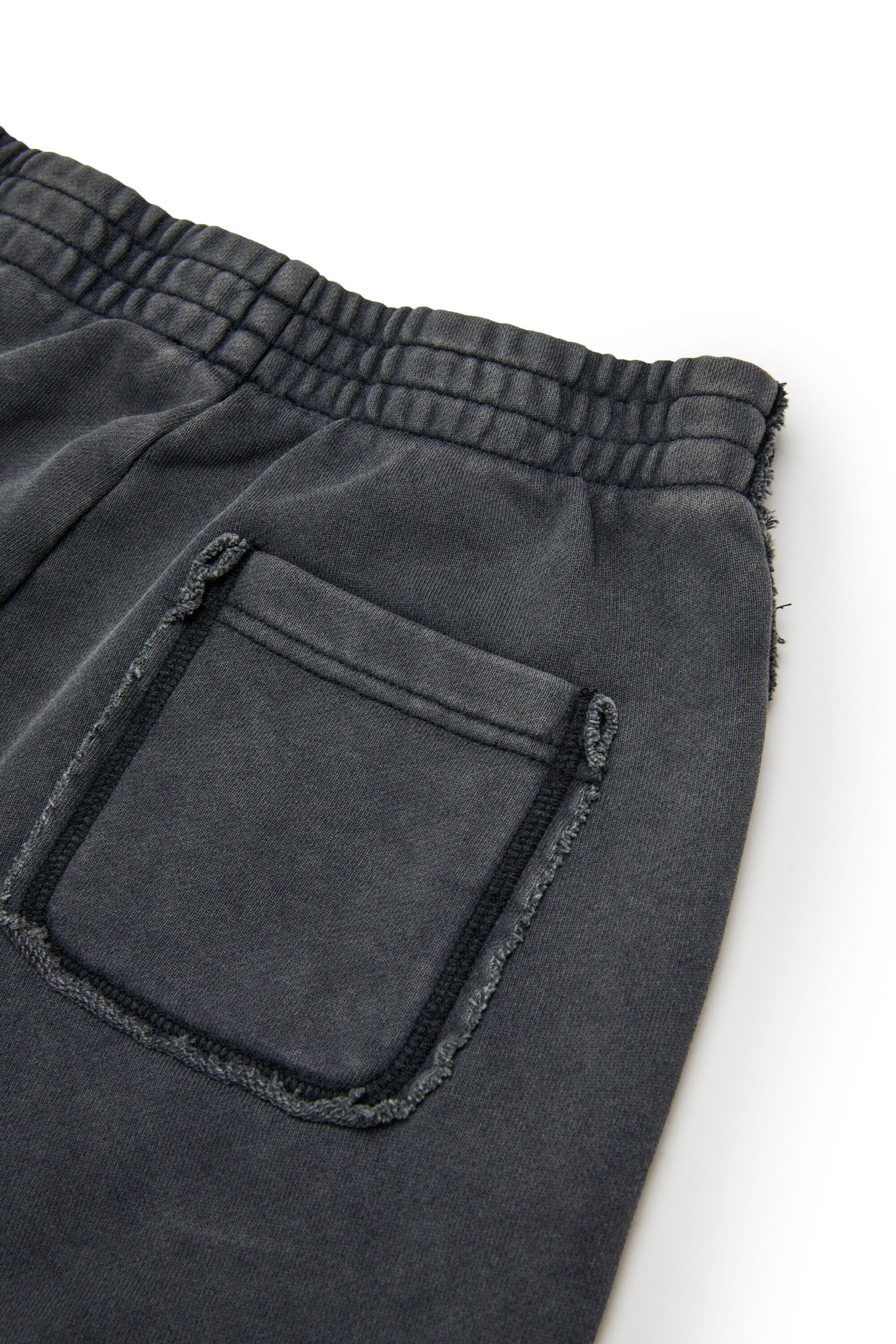 Pantalones deportivos con gráficos góticos