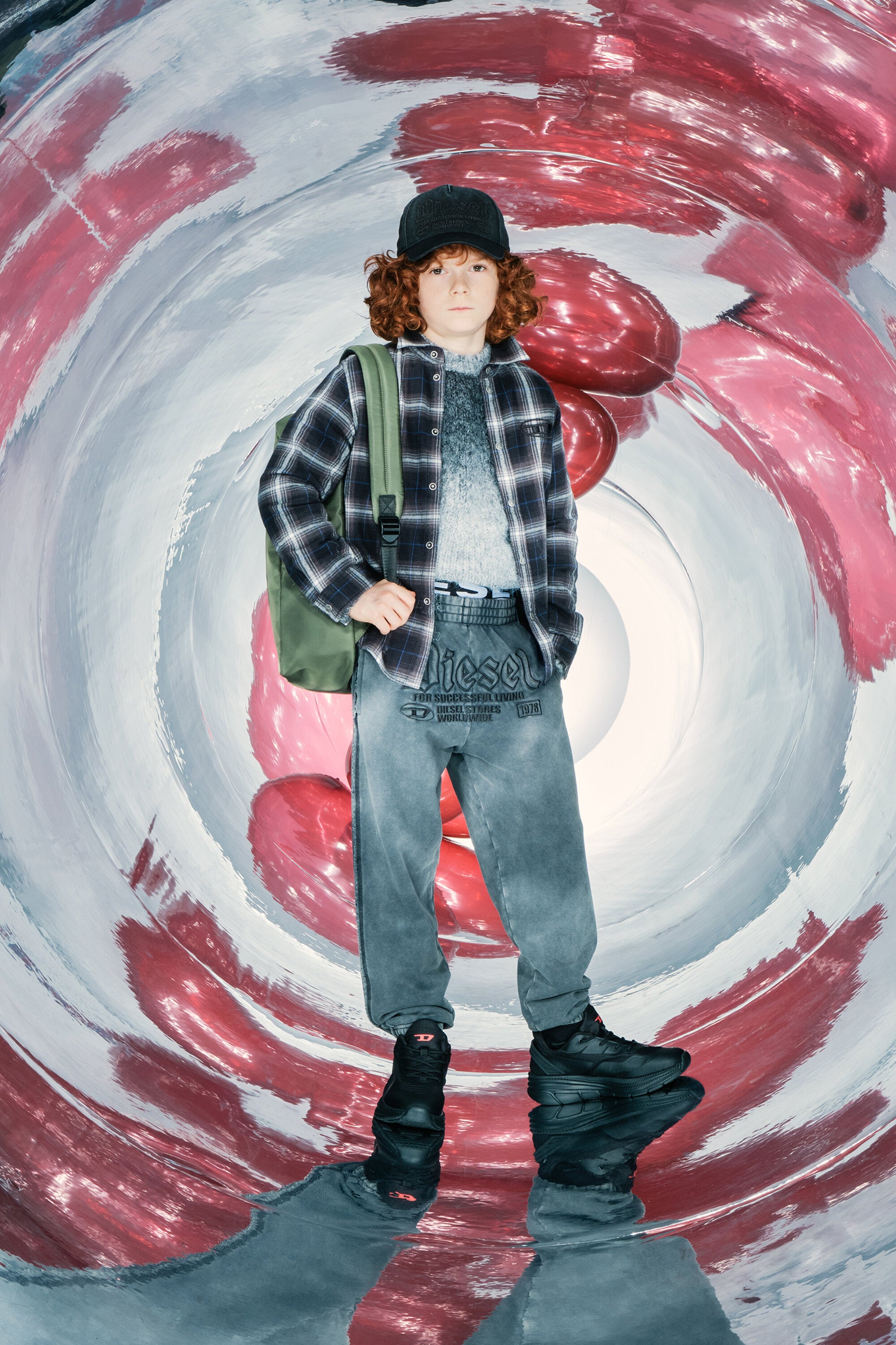 Jogger pants with gothic graphics