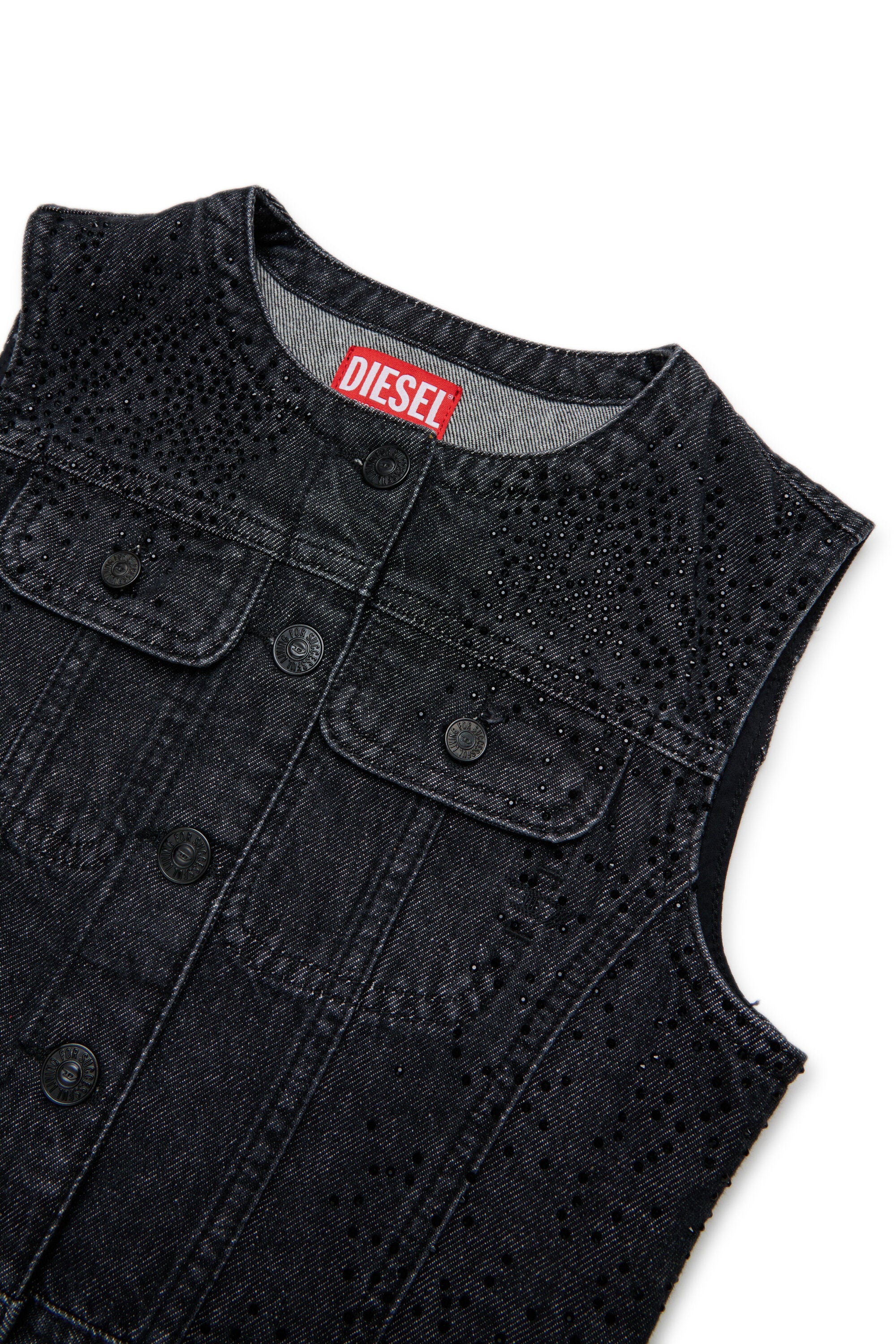 Chaleco denim negro con hotfix