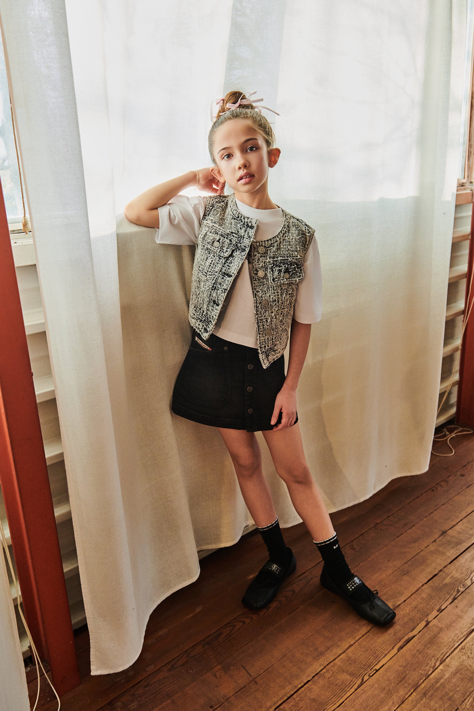 Sleeveless denim jacket with logo