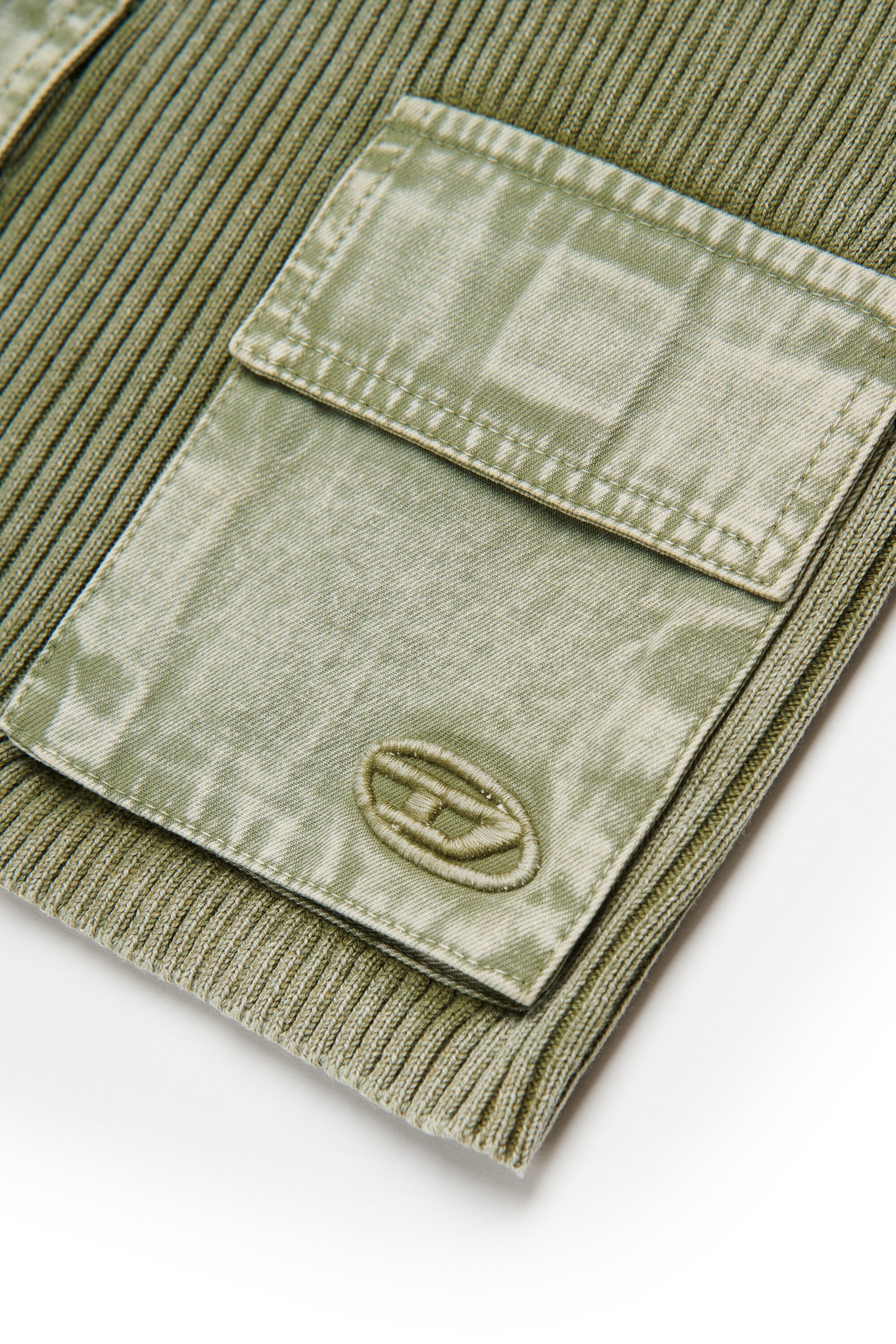 Top de punto acanalado con bolsillos