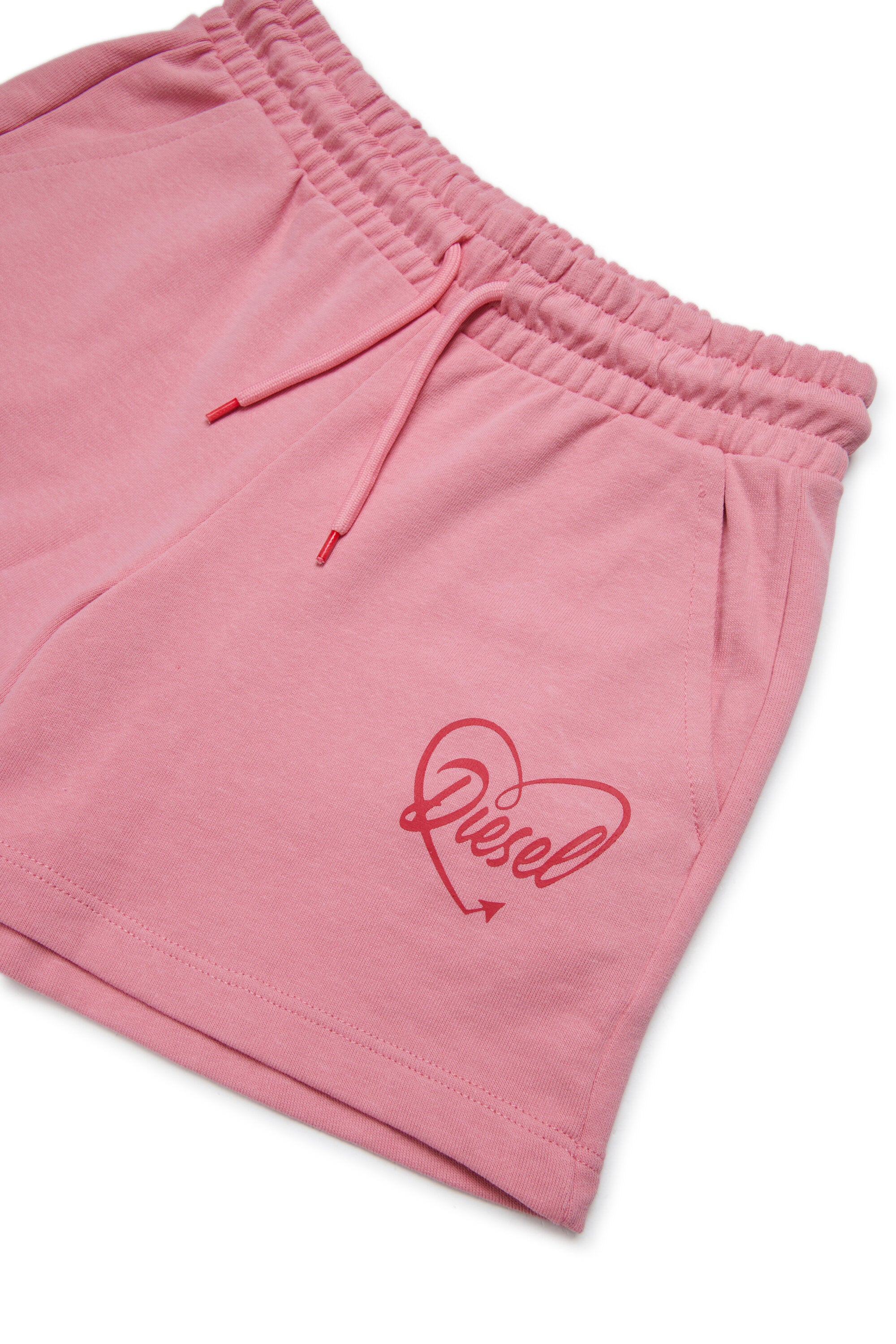 Short jumpsuit with logo