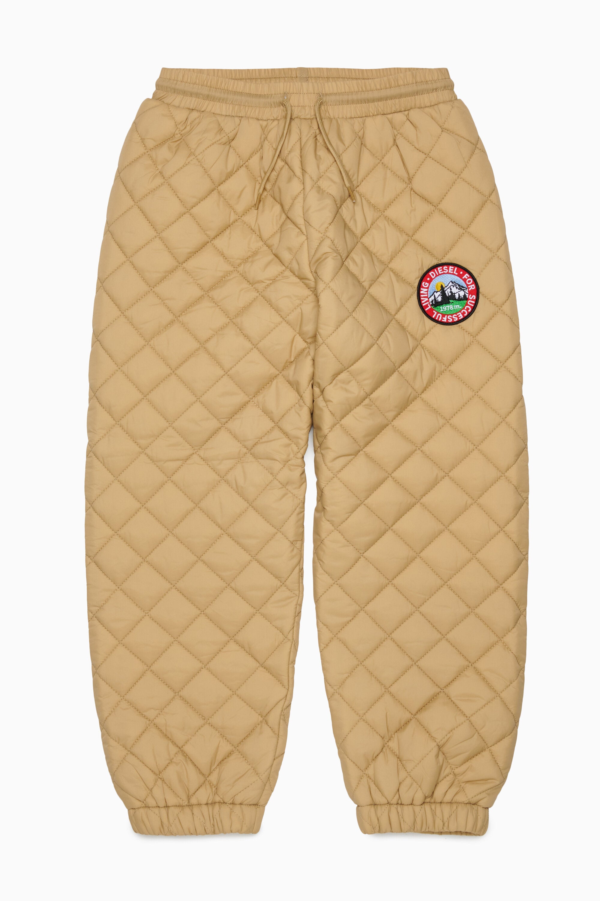 Pantalones acolchados con parche delantero