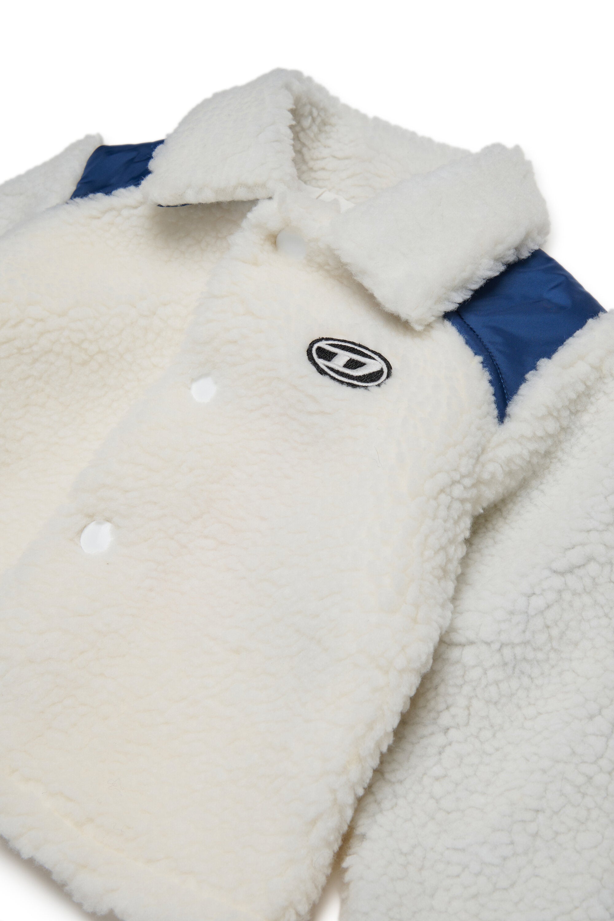 Chaqueta Teddy con inserciones en contraste