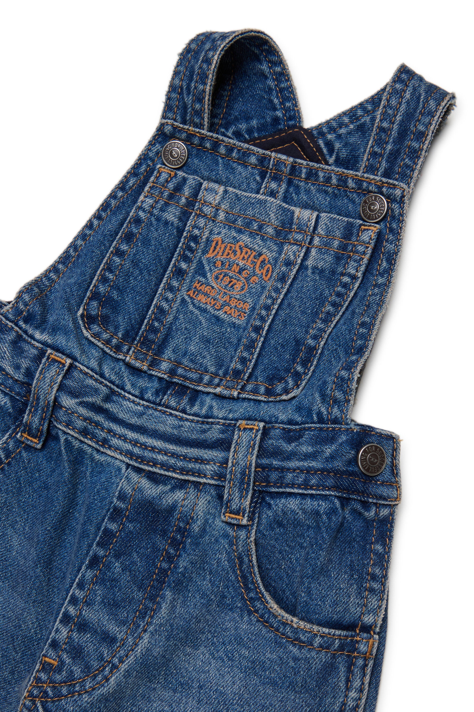 Denim overalls with logo