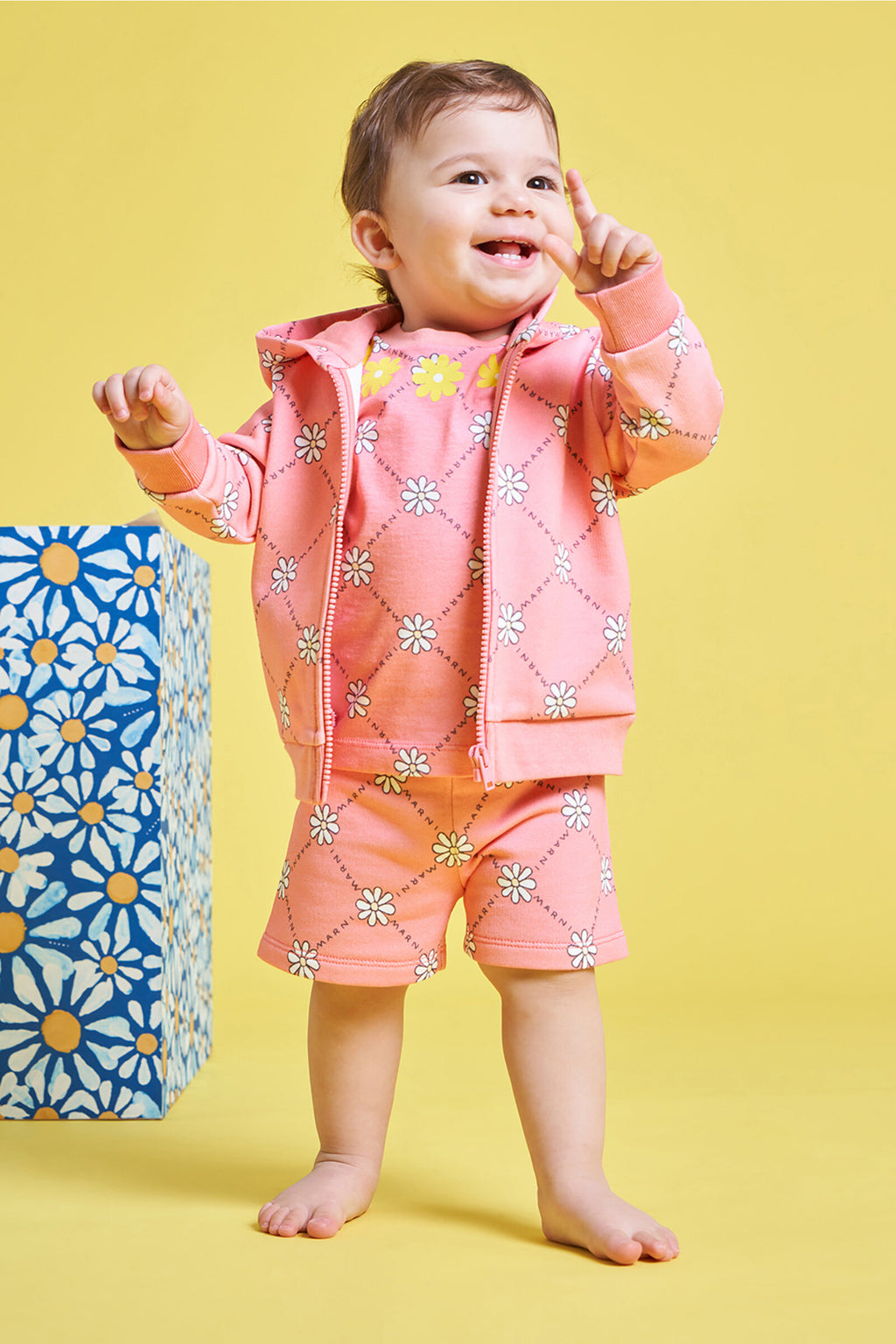 Peach pink cotton hooded sweatshirt with daisy pattern