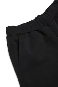 Pantalones cortos en chándal con marca