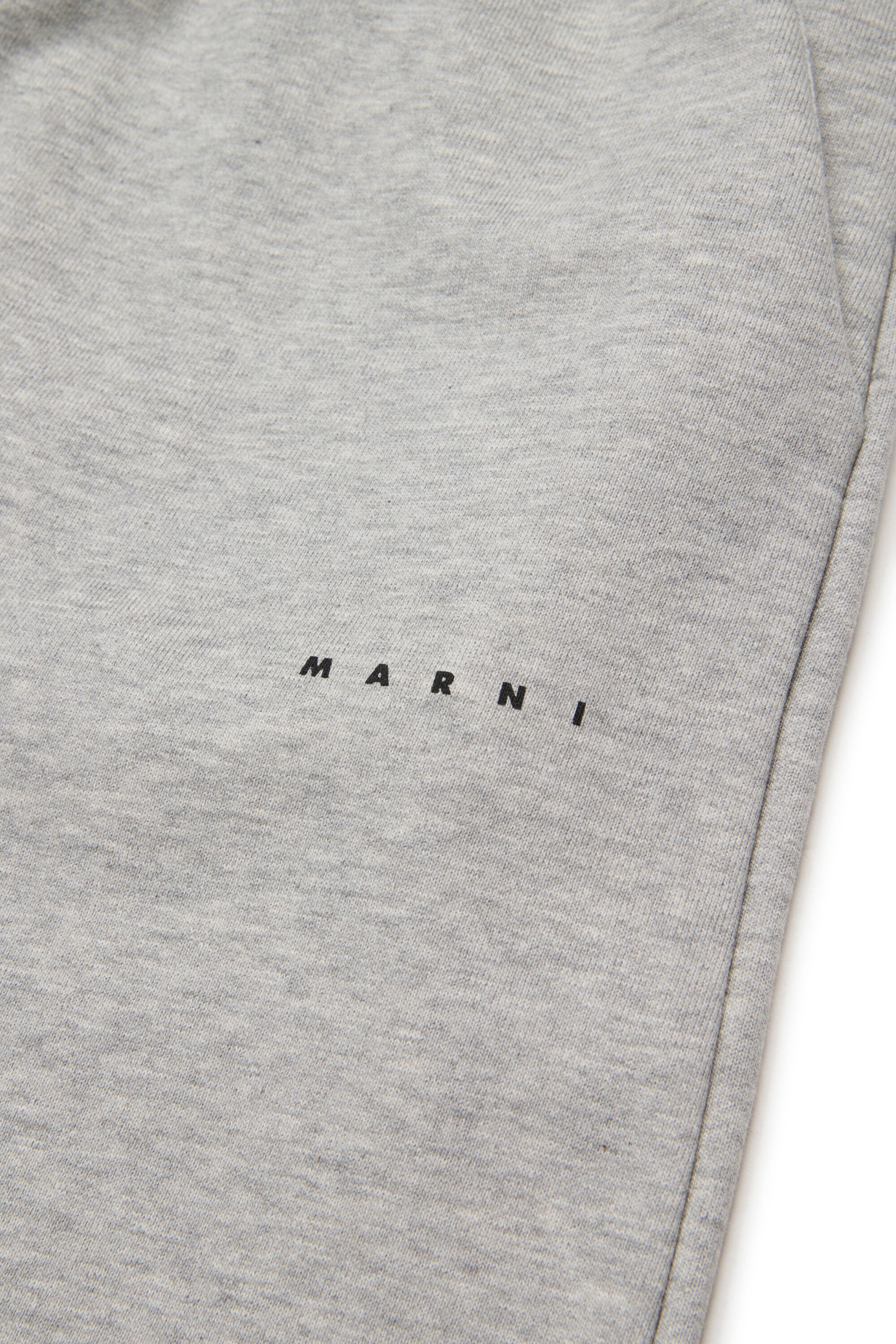 Pantalones con pernera ancha de felpa de marca