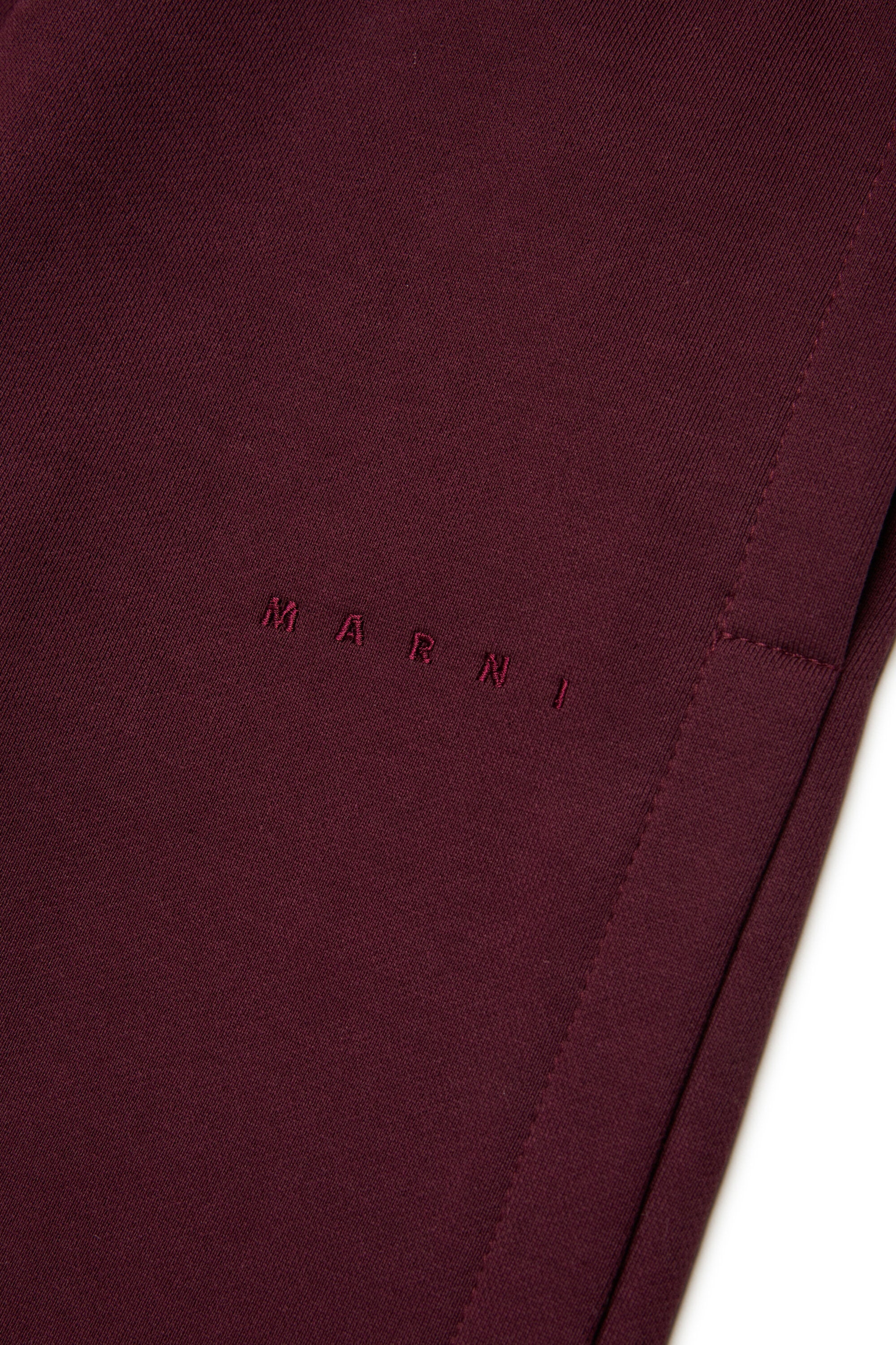 Pantalones sudadera con abertura lateral