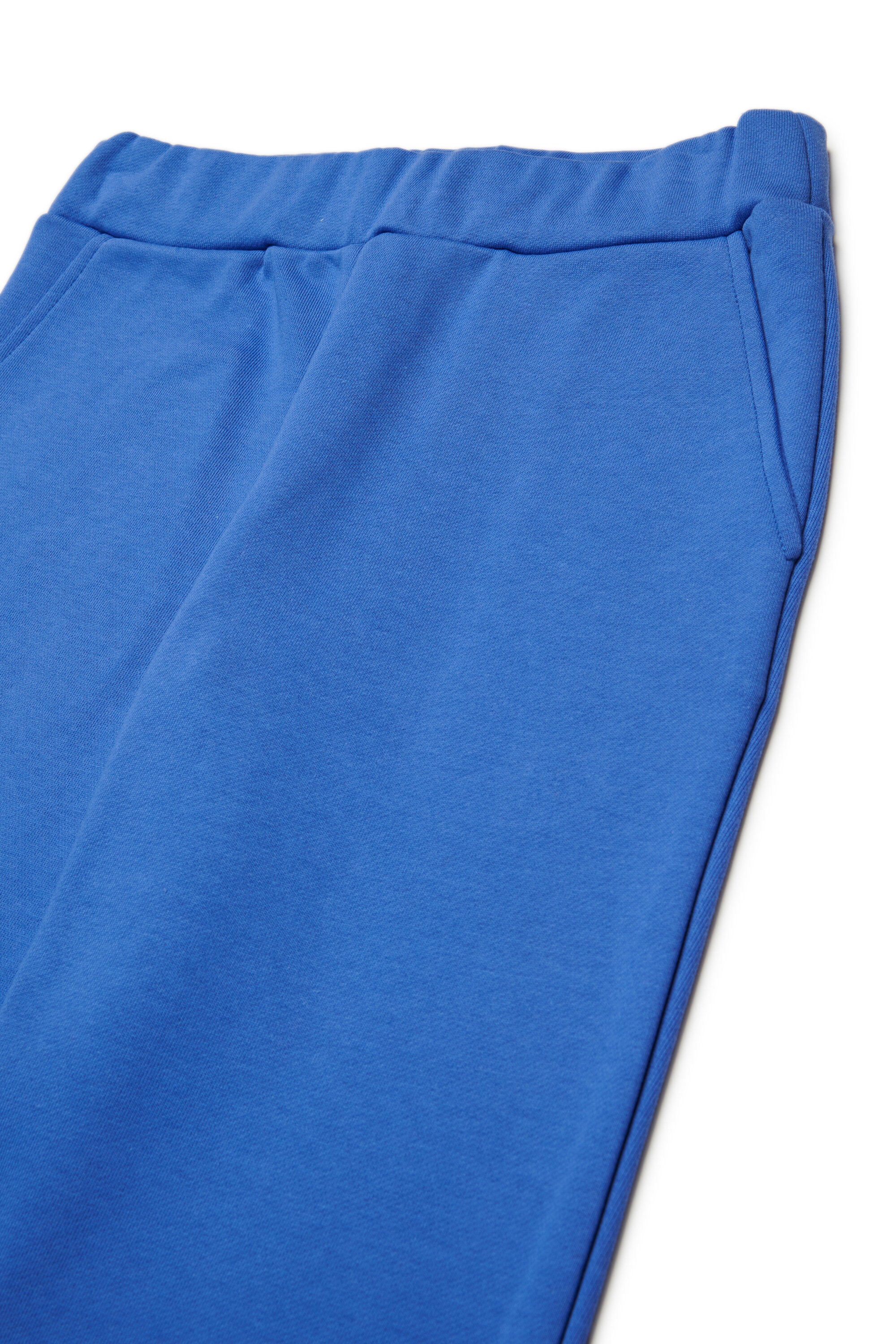 Pantalones deportivos de felpa con puños elásticos en los tobillos