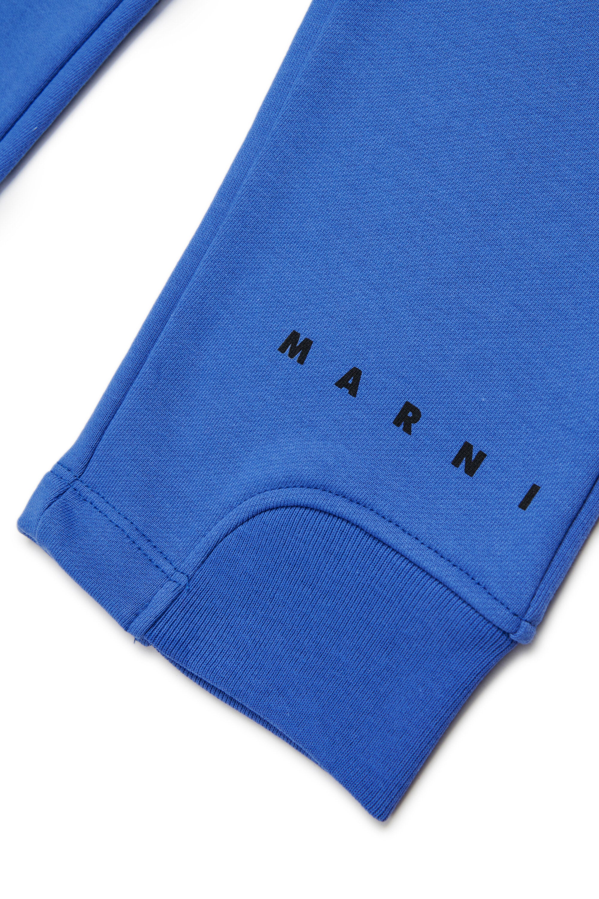 Pantalones deportivos de felpa con puños elásticos en los tobillos