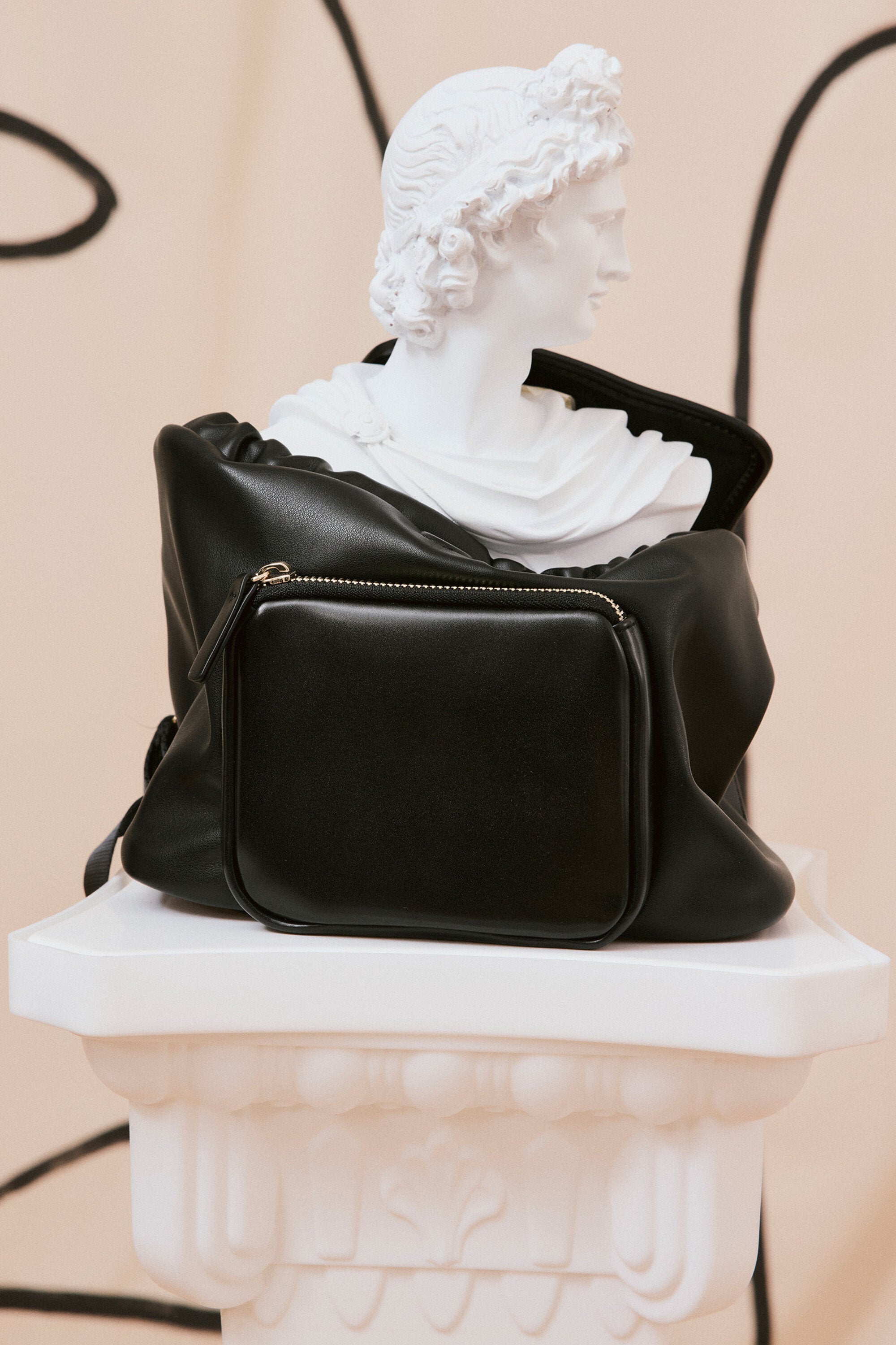 Mochila de tela revestida con logotipo