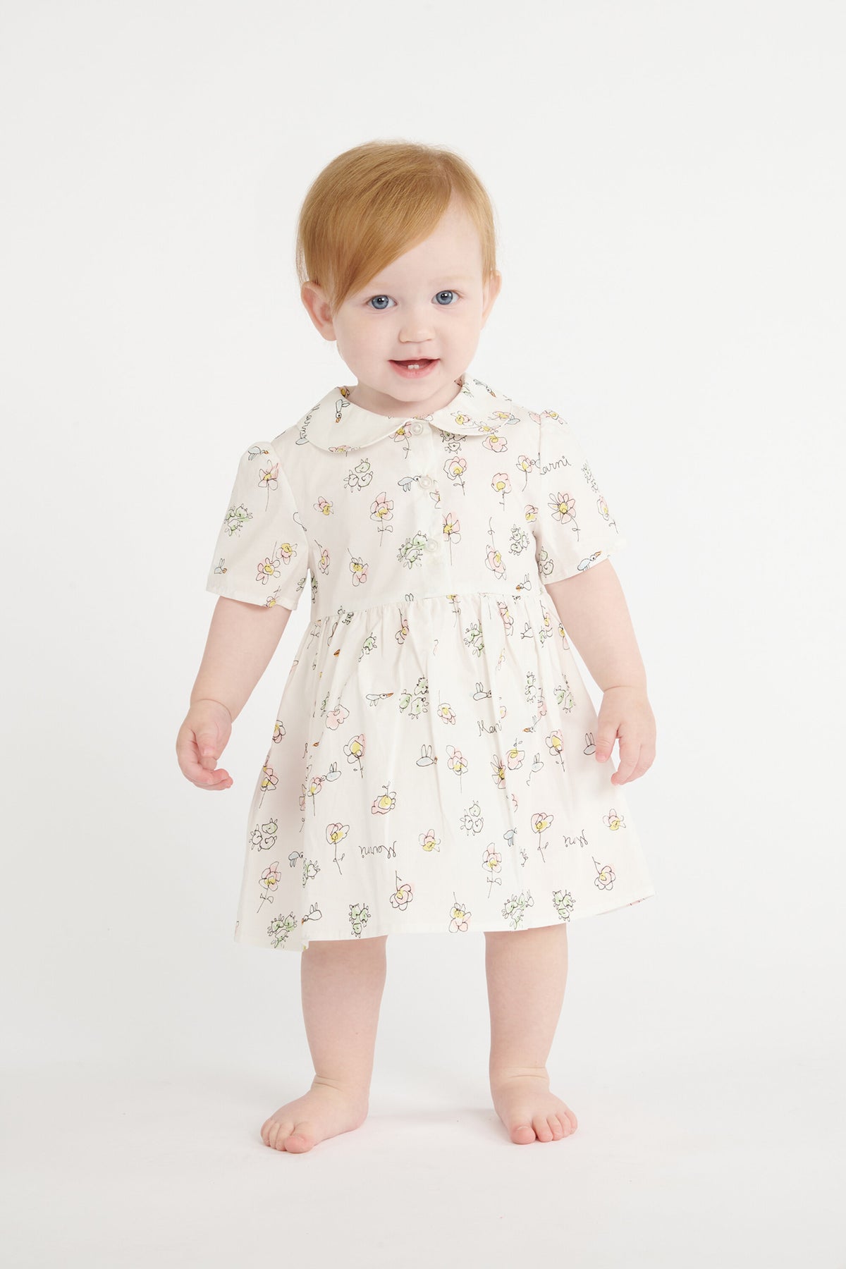 Dress with floral print and rounded collar