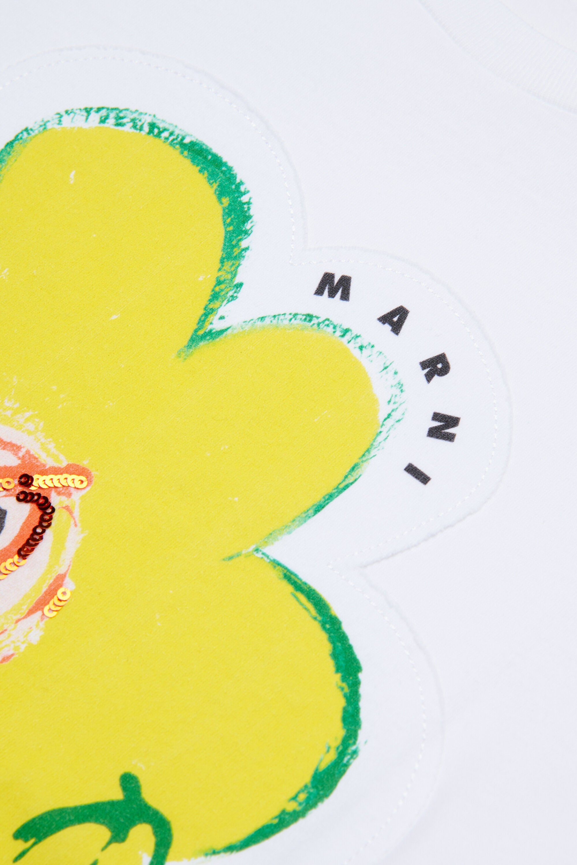 T-shirt with appliqué flower and logo