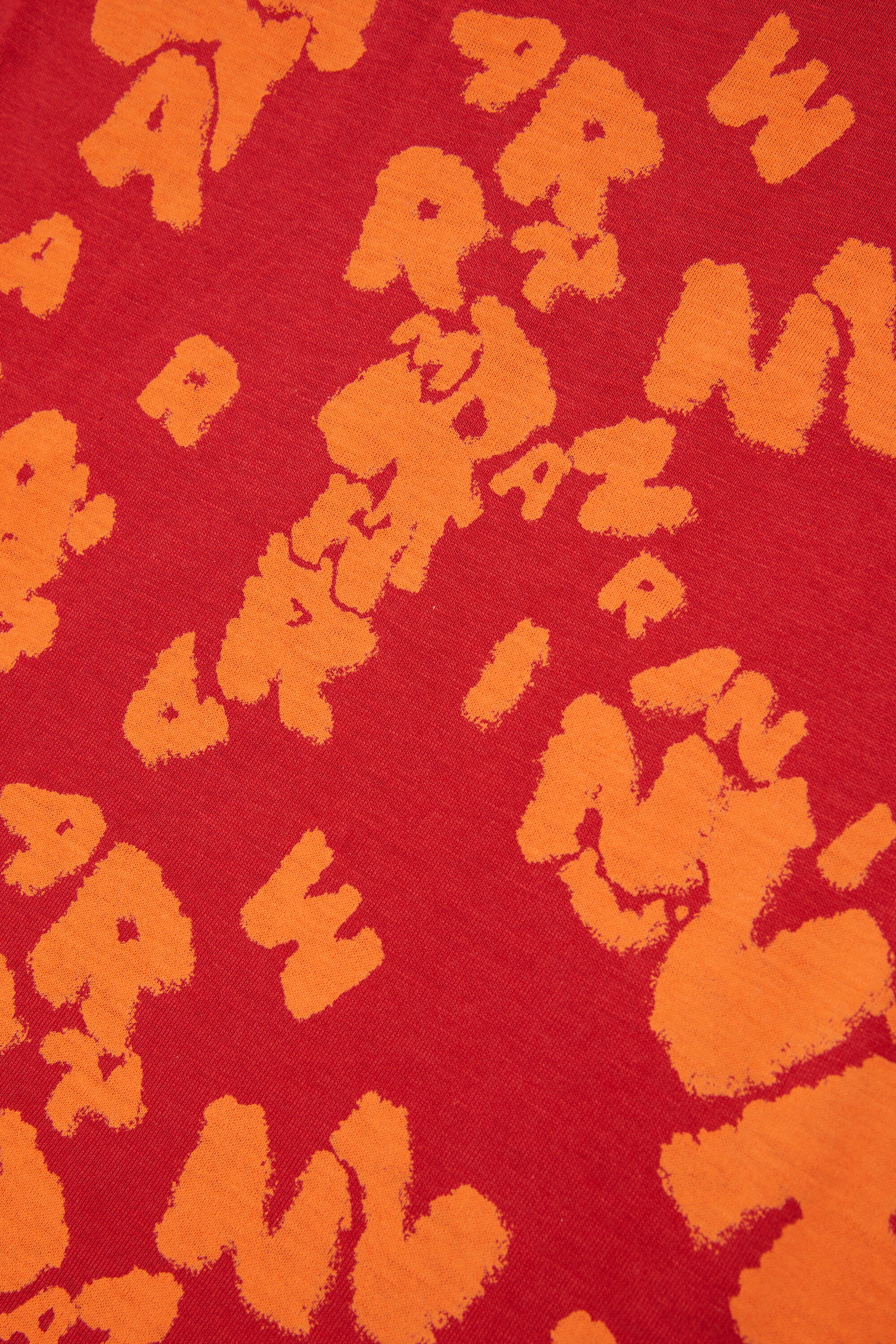 Sleeveless T-shirt with all-over logo