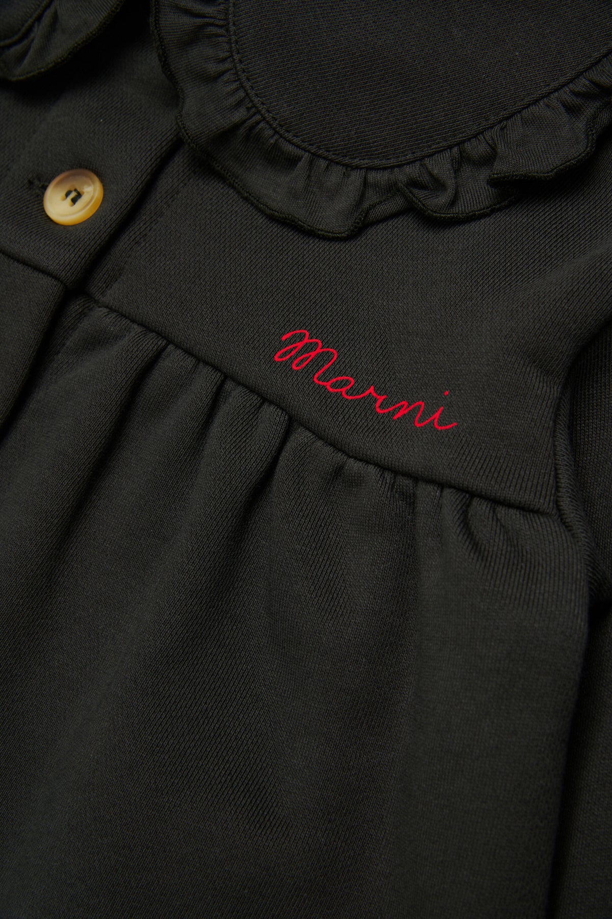 Chaqueta con logo y volantes