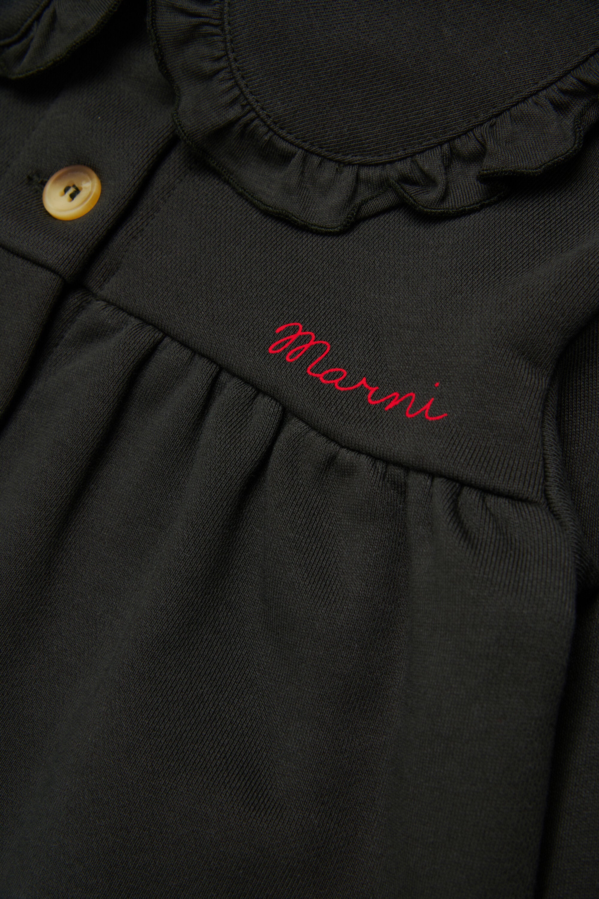 Chaqueta con logo y volantes