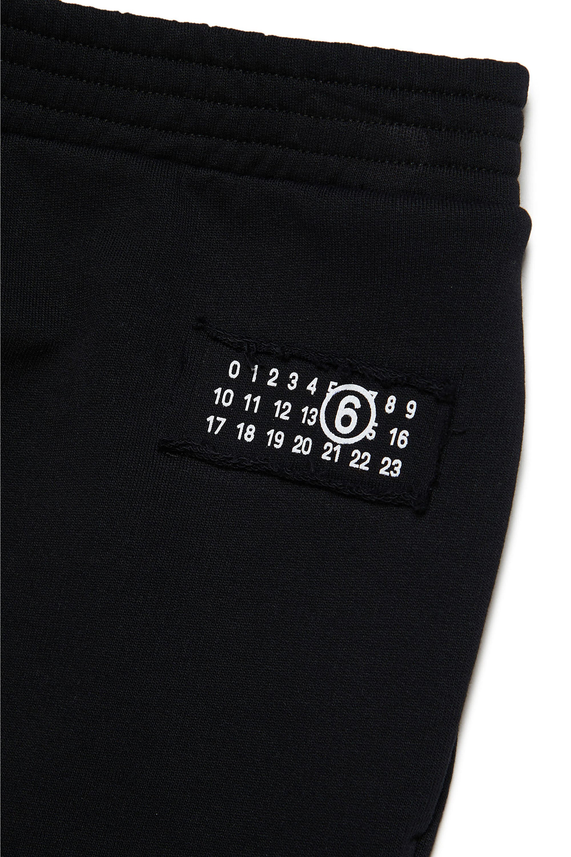 Pantalones en chándal con numeric logo