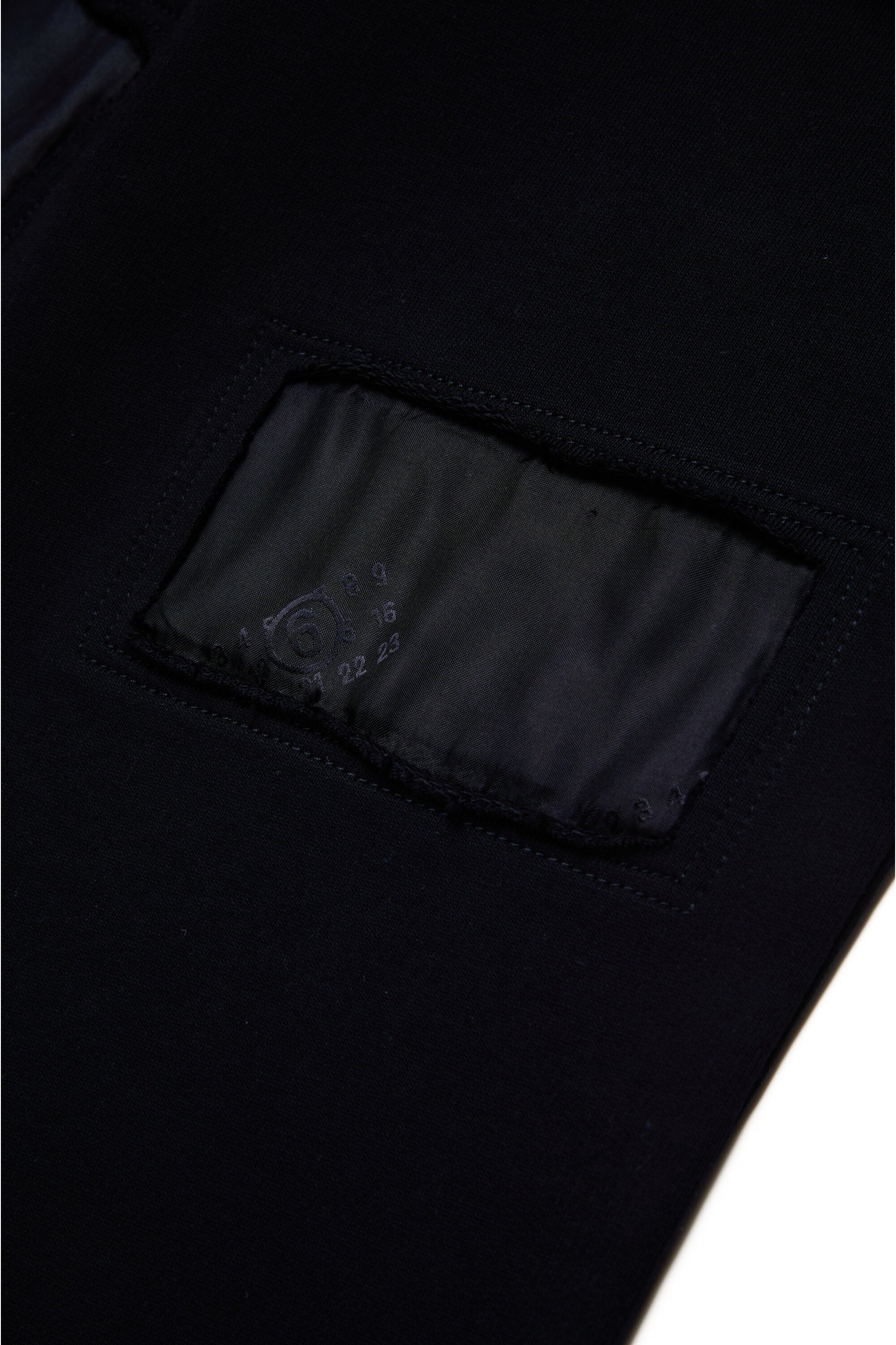 Fleece trousers with logoed inserts