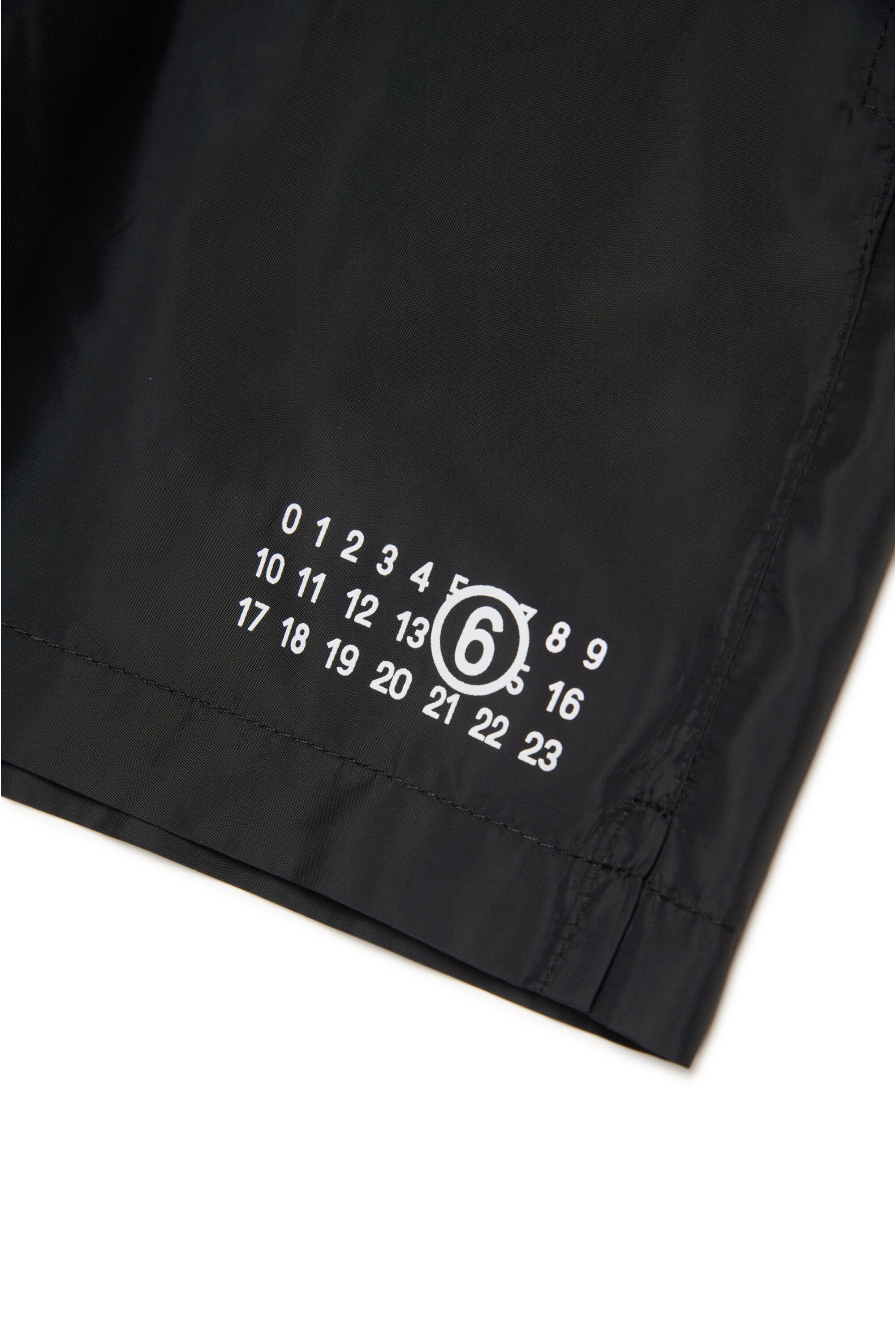 Bañador bóxer con la marca Numeric logo