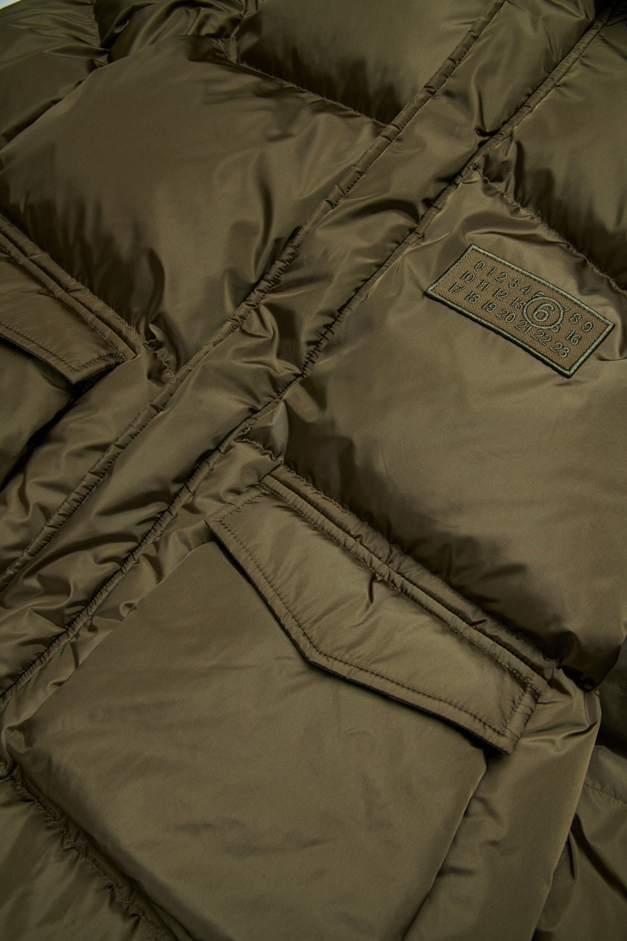 Chaqueta larga acolchada con bolsillos