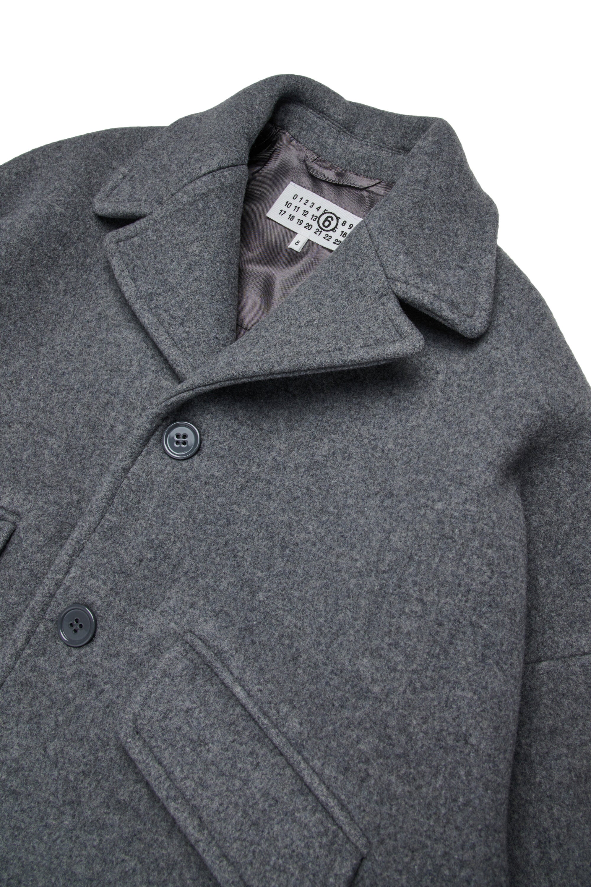 Abrigo en forma de huevo con forro interior