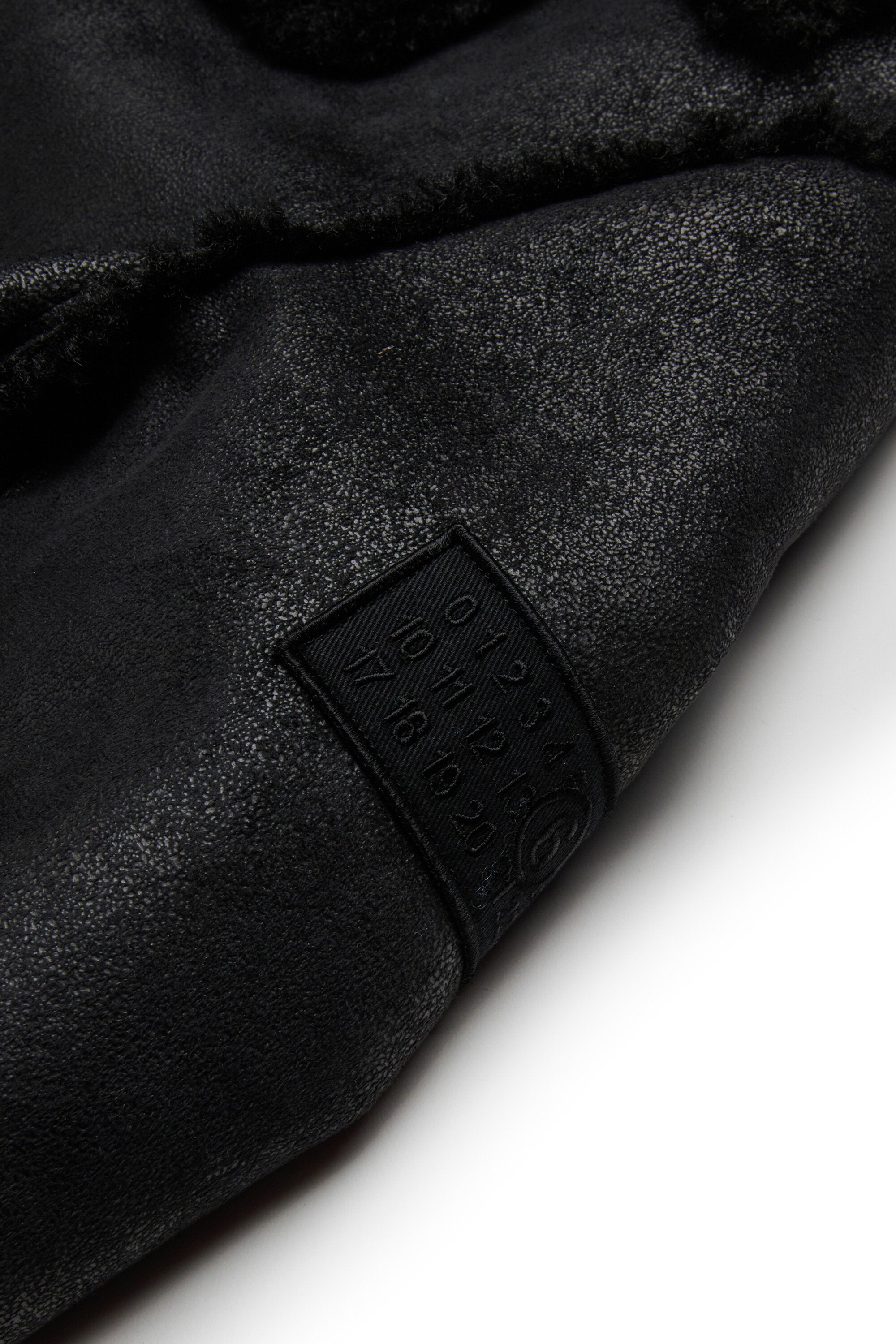 Chaqueta de piel de oveja con detalles de peluche