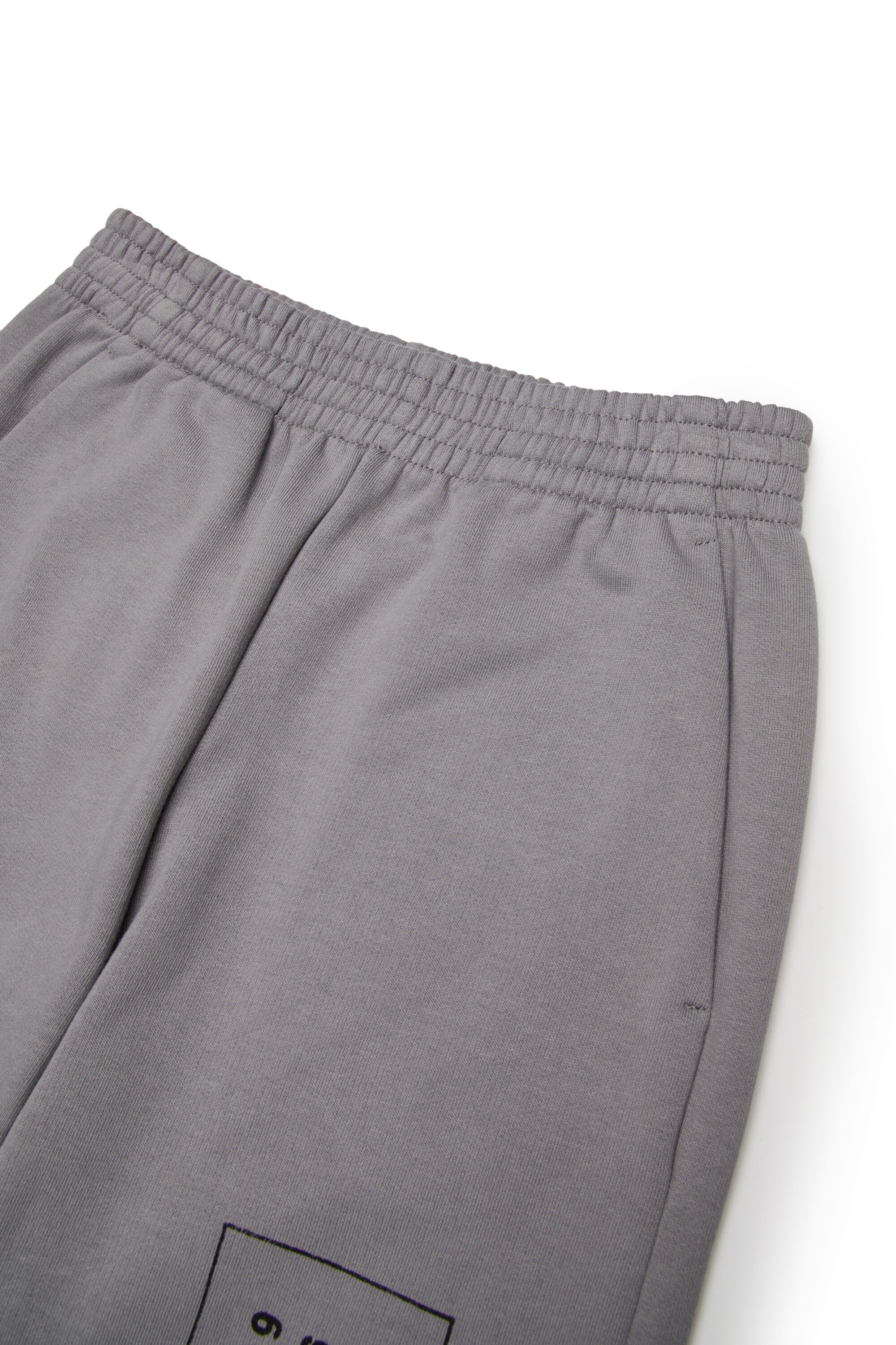 Pantalones de sudadera recortada bicolor