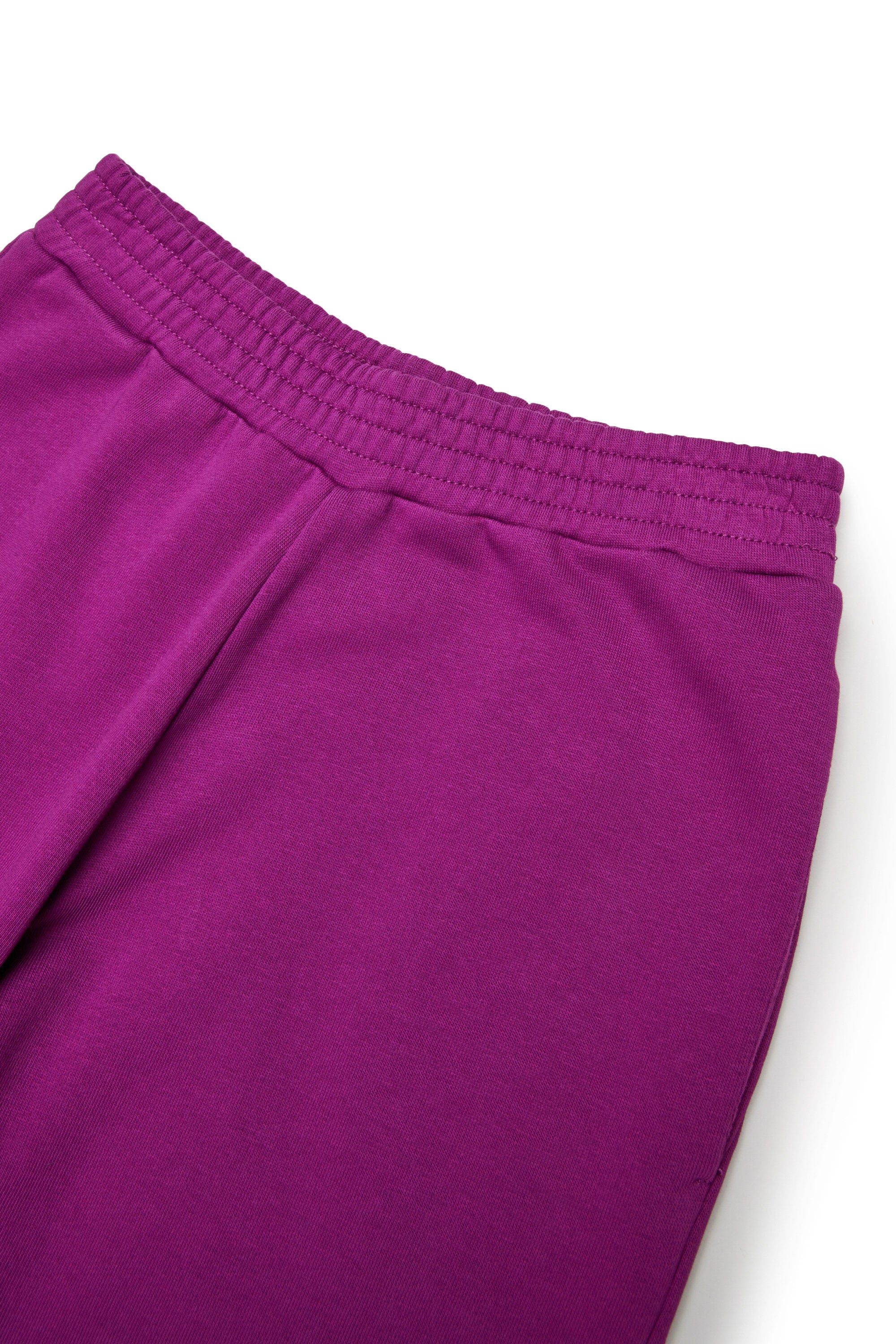 Split jogger pants branded with Hand Written logo