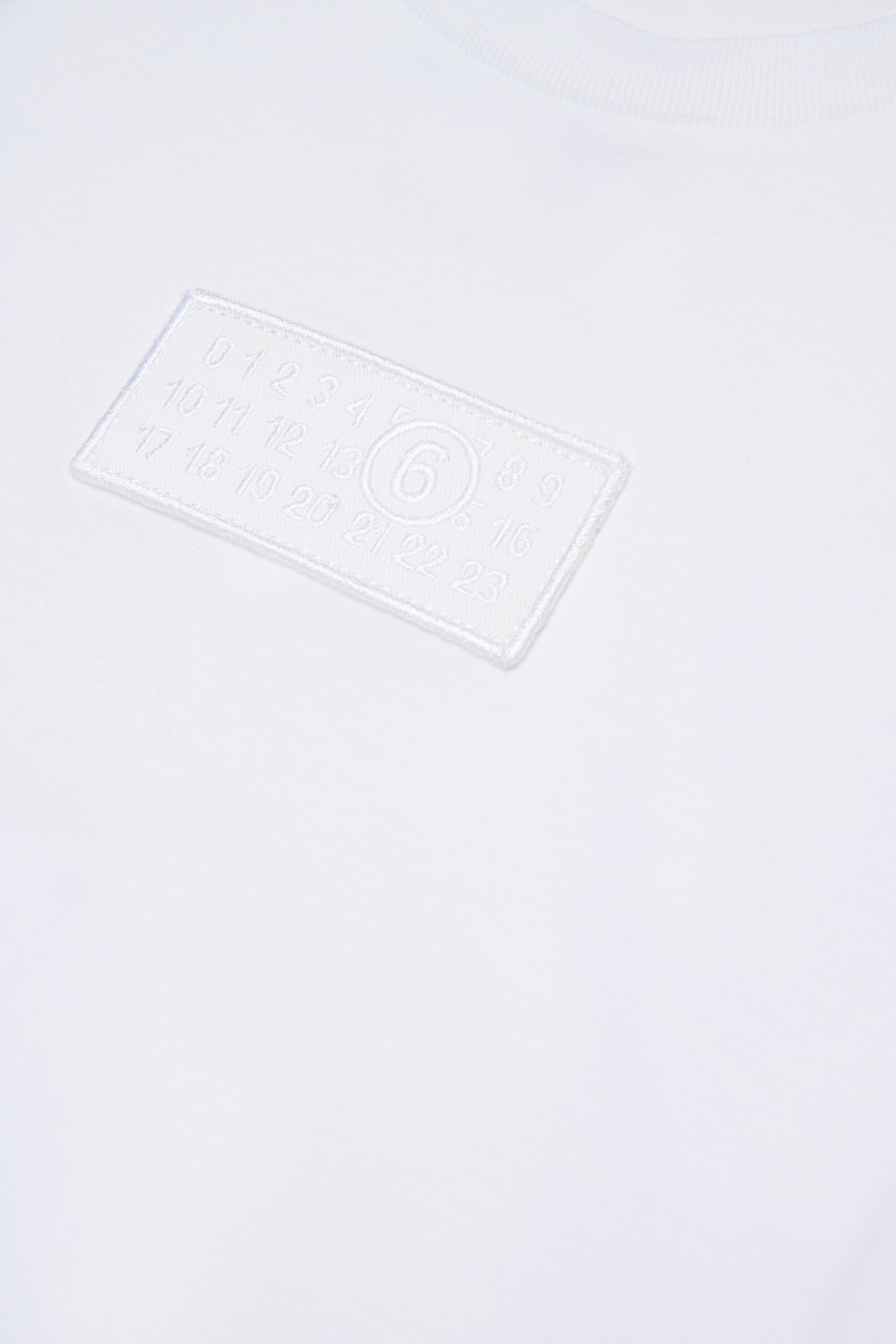 Camiseta de manga larga de jersey con parche del logotipo Numeric