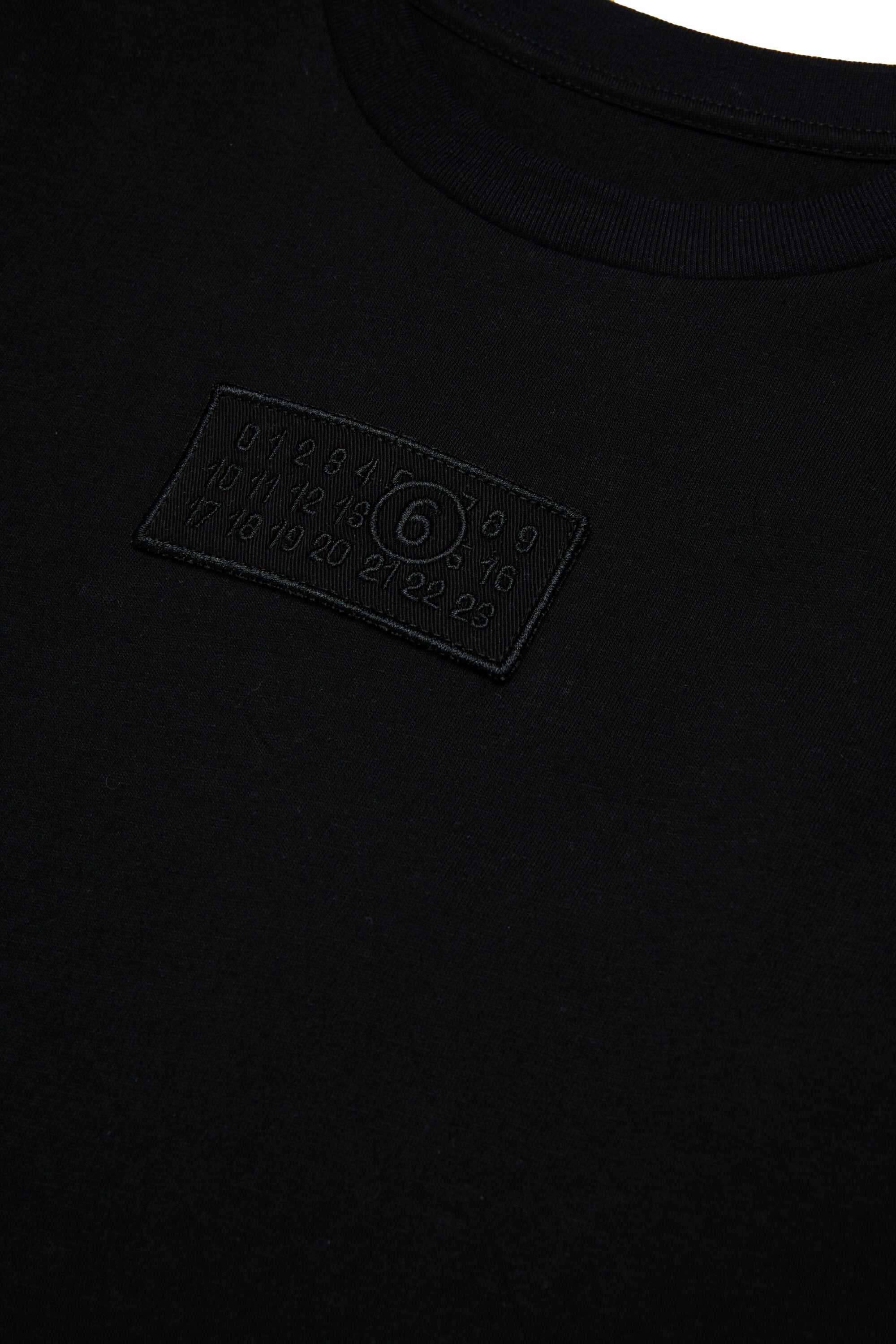 Camiseta de manga larga de jersey con parche del logotipo Numeric