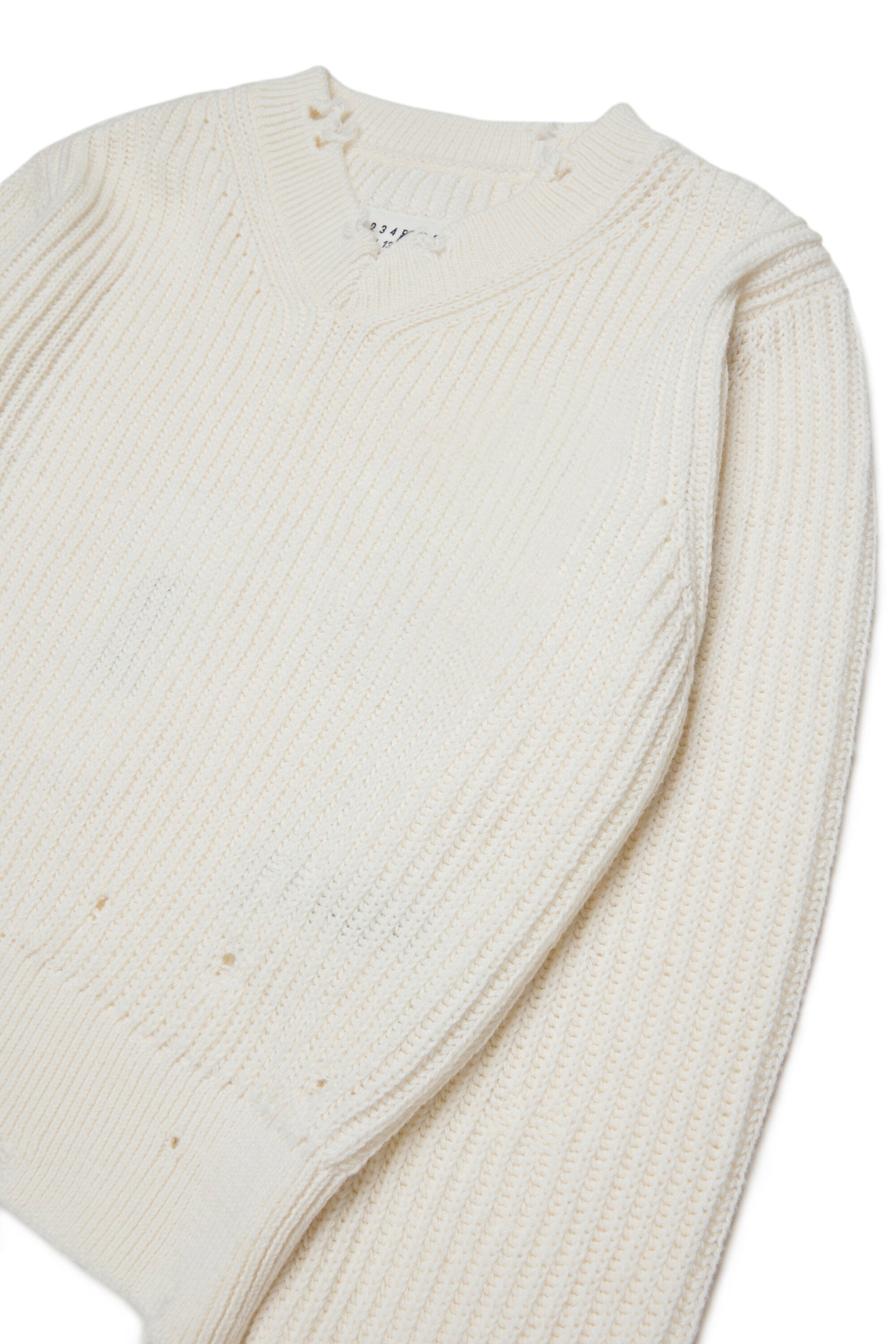 Jersey de cuello en V con detalles desgastados