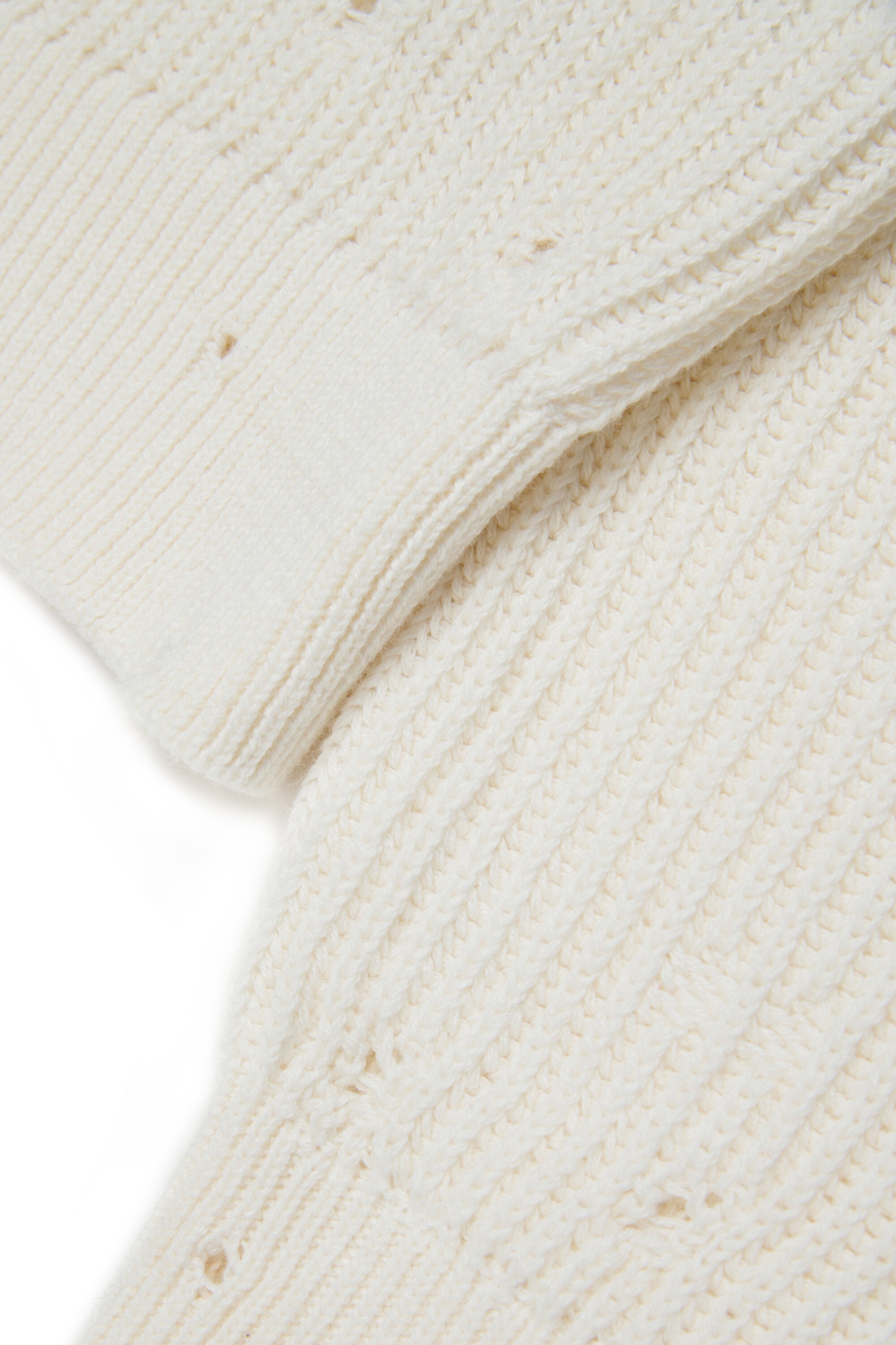 Jersey de cuello en V con detalles desgastados