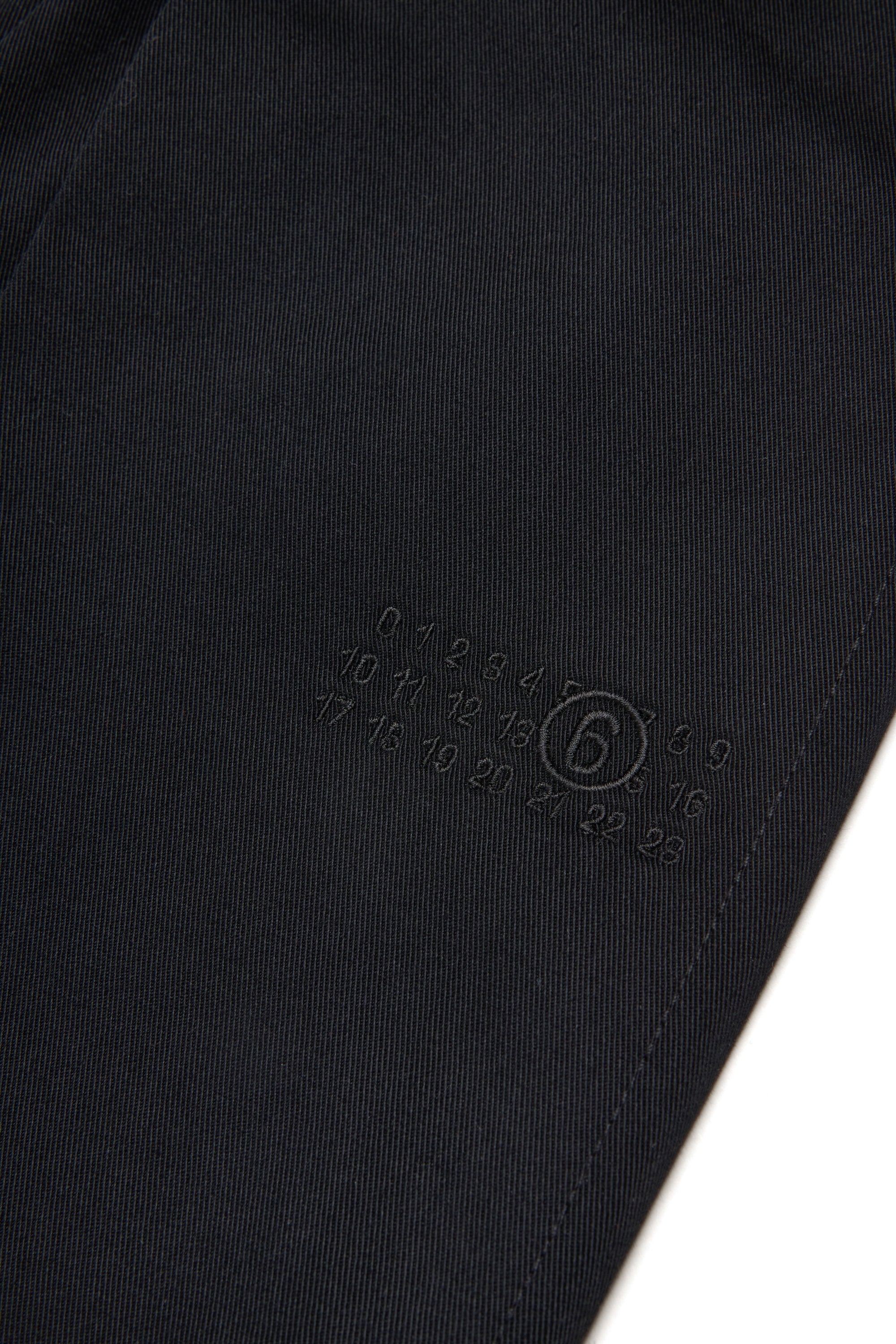 Numeric logo trousers