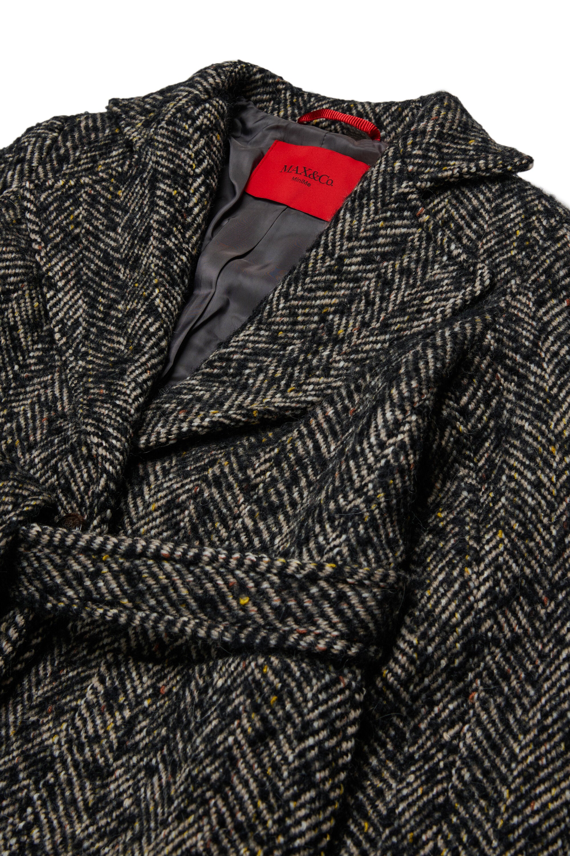 Coat with herringbone pattern