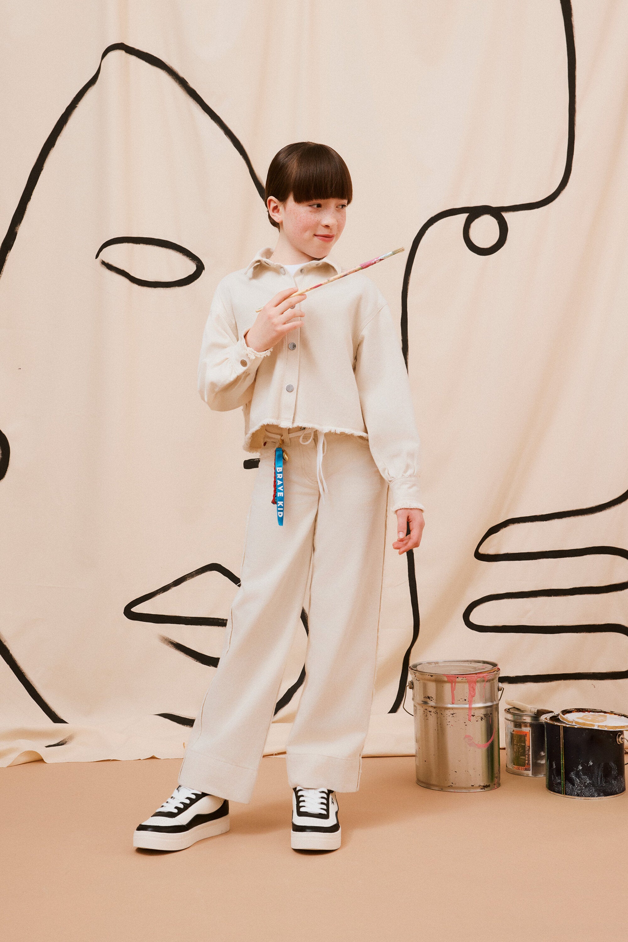 Flare jeans with raw cut details