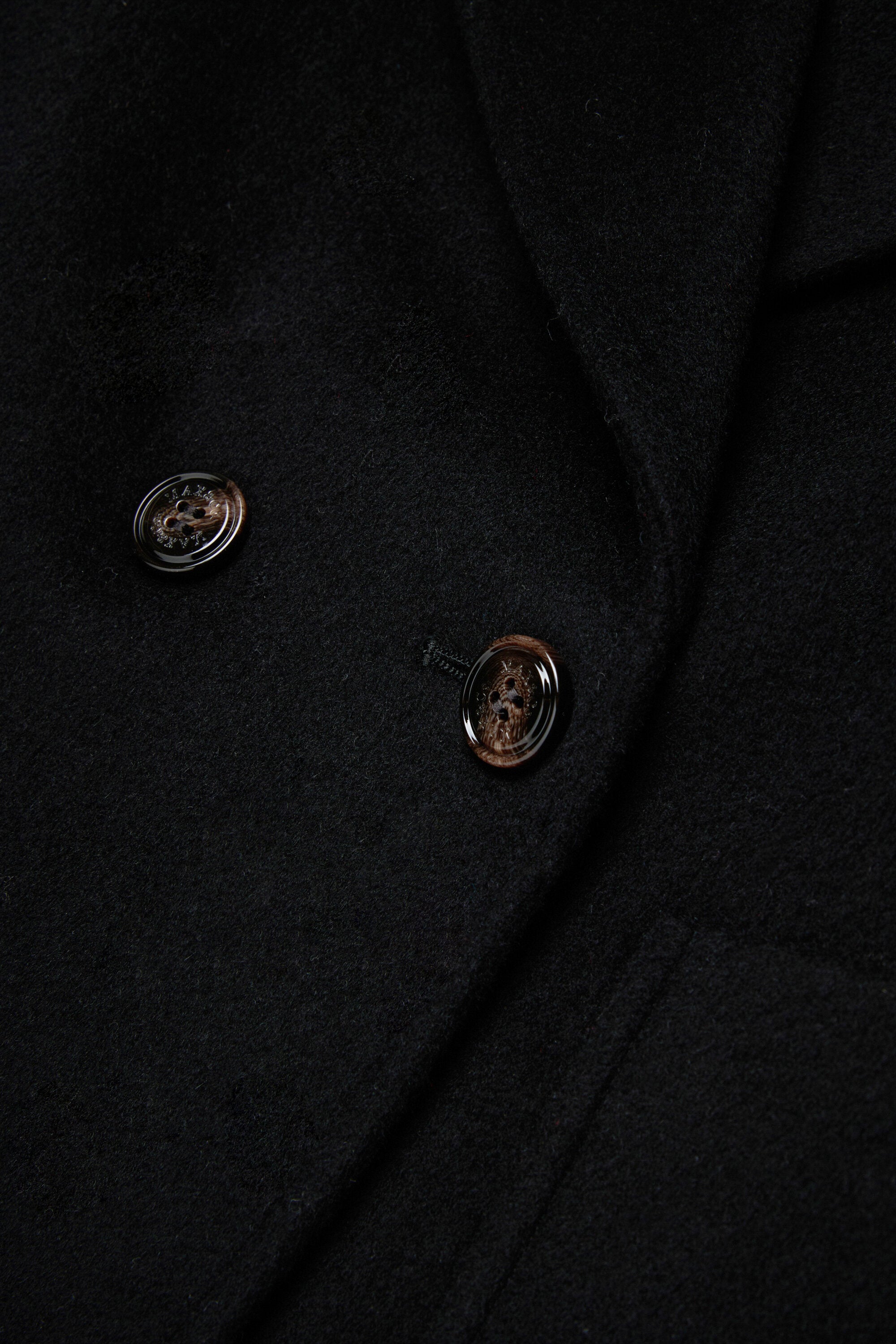 Abrigo caban de doble botonadura en lana afeitada