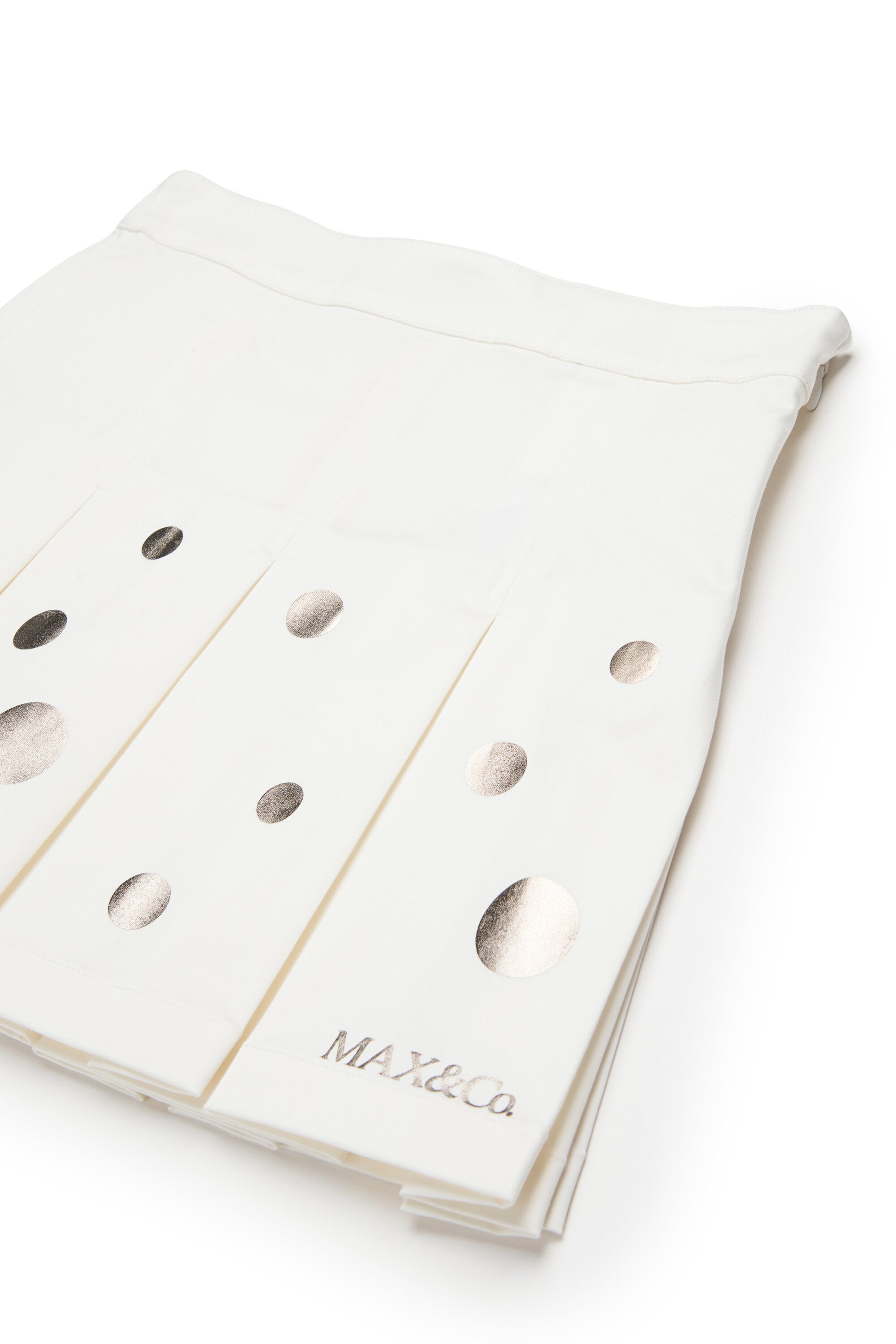 Pleated skirt with metallic polka dots