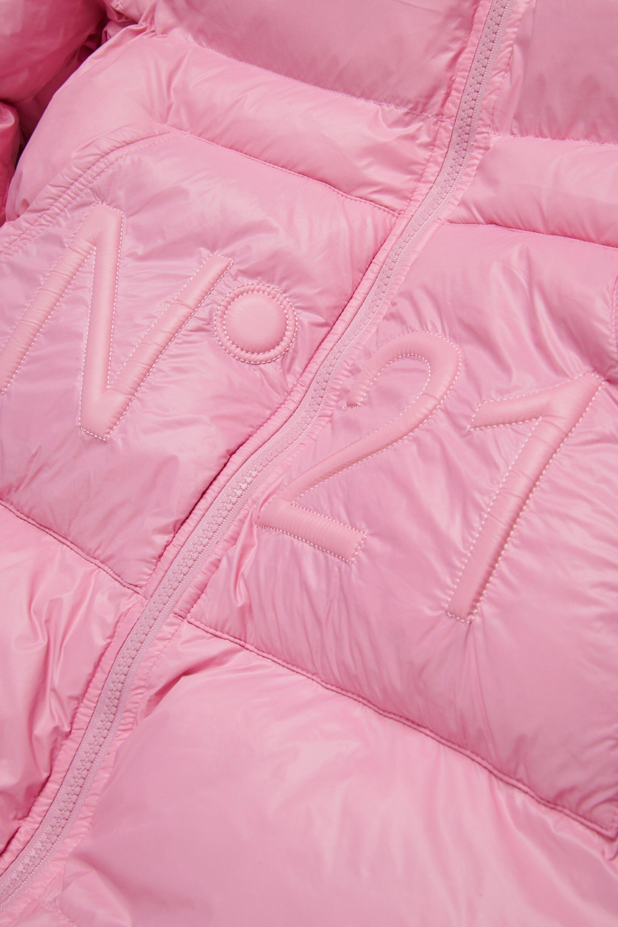 Chaqueta larga acolchada con dobladillo asimétrico