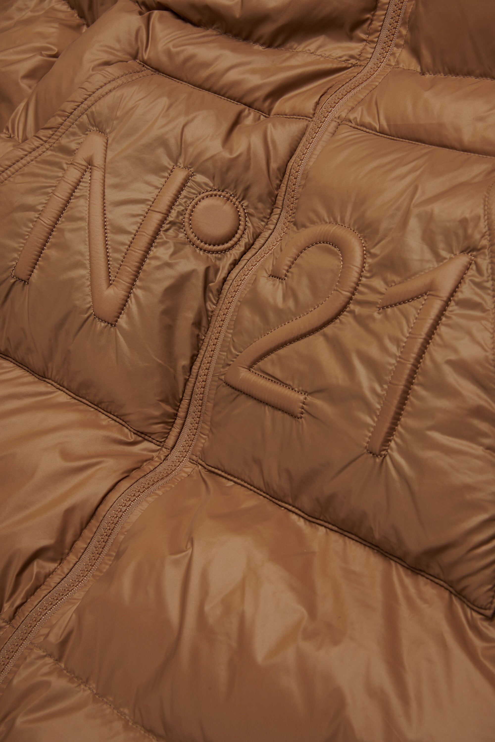 Long padded jacket with asymmetrical bottom