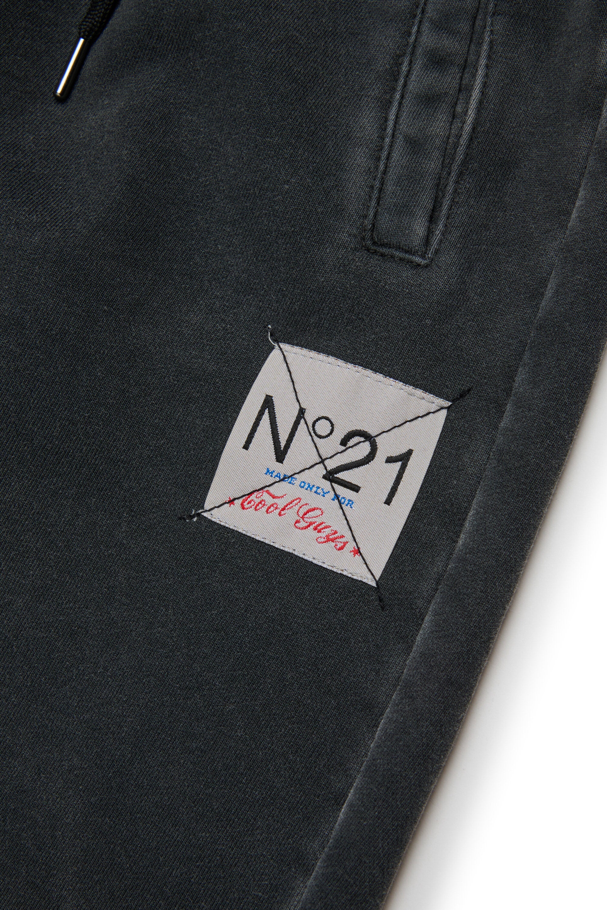 Pantalones deportivos en felpa con efecto desgastado