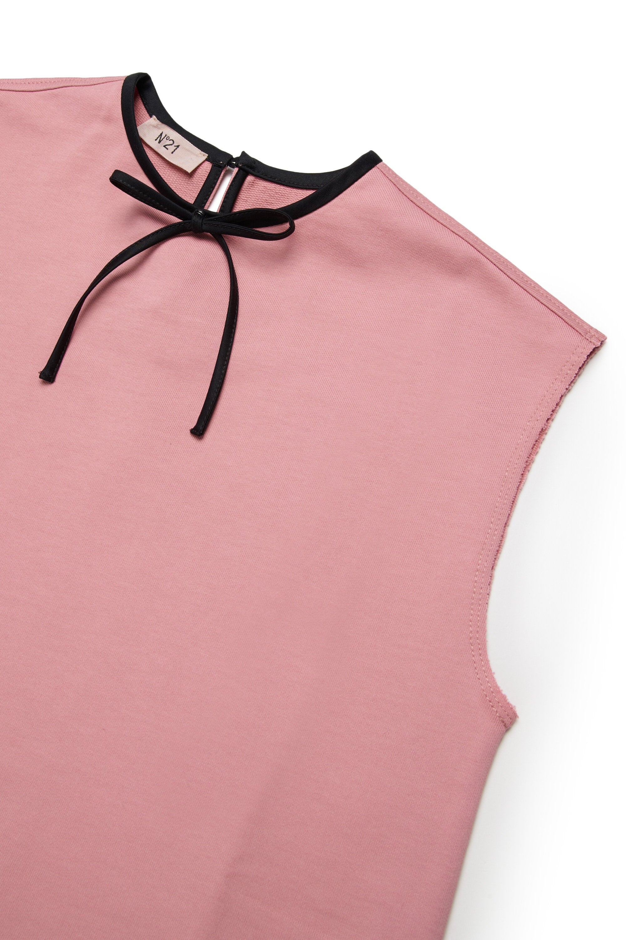Dress with ruffle and contrasting bow