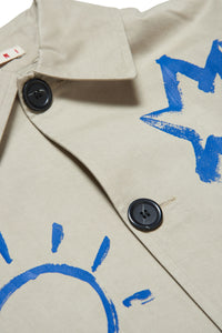 Beige gabardine trench with graffiti and printed faces