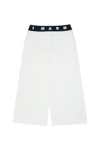 White cotton trousers with printed face