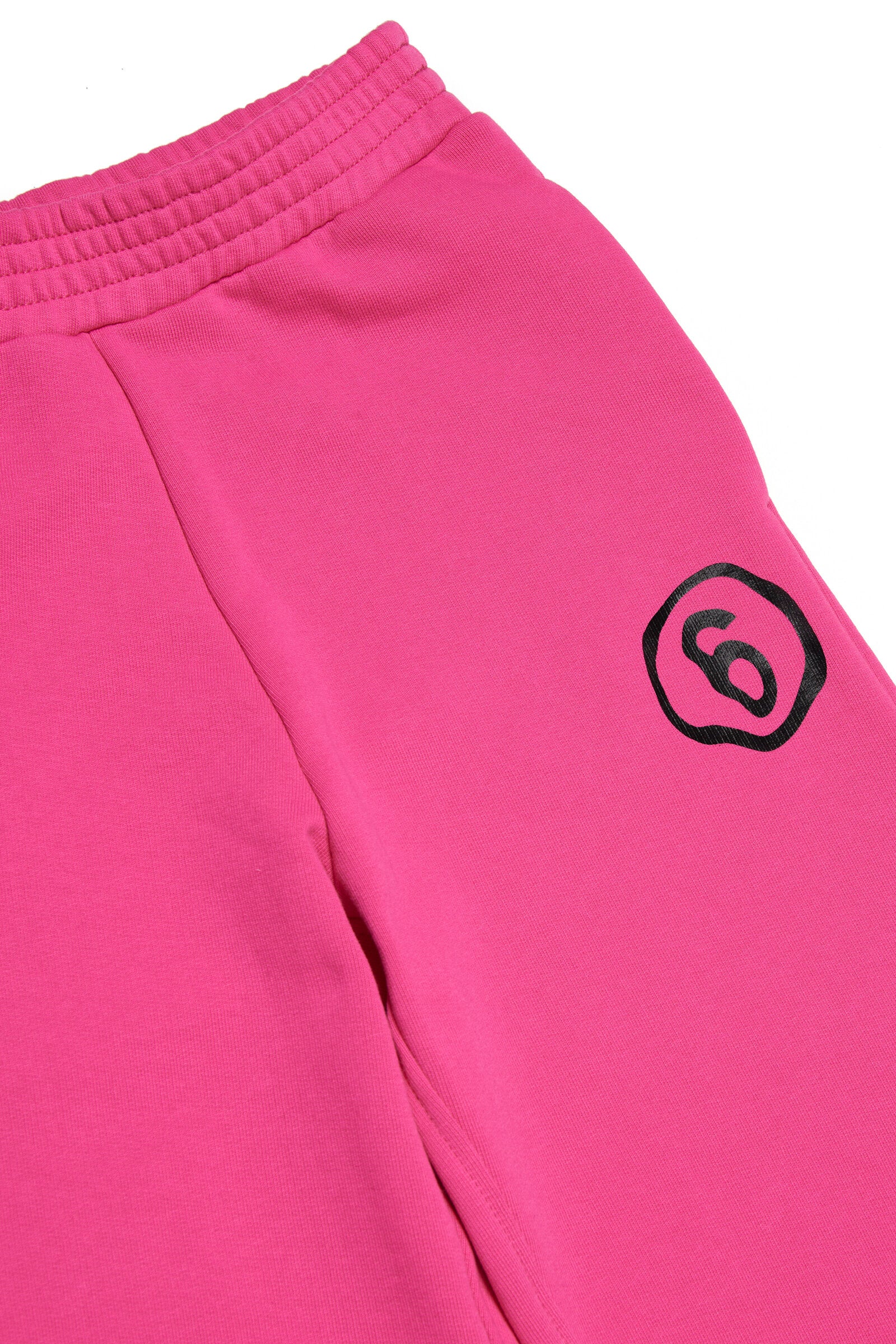 Pink fleece trousers with logo 6 and internal slits at the leg bottom